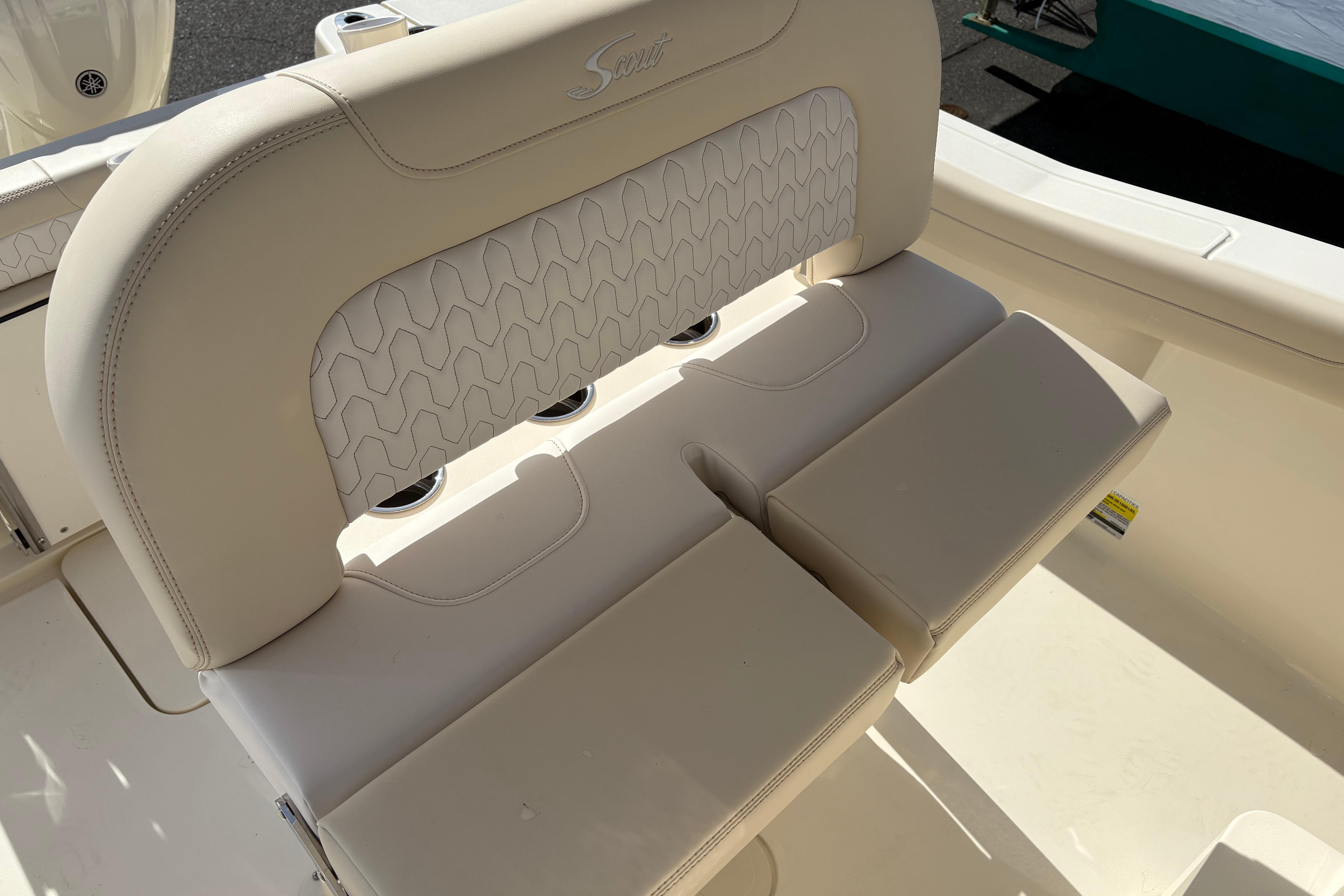 2026 Scout 220 XSF boat seat with beige upholstery and stylish stitching.