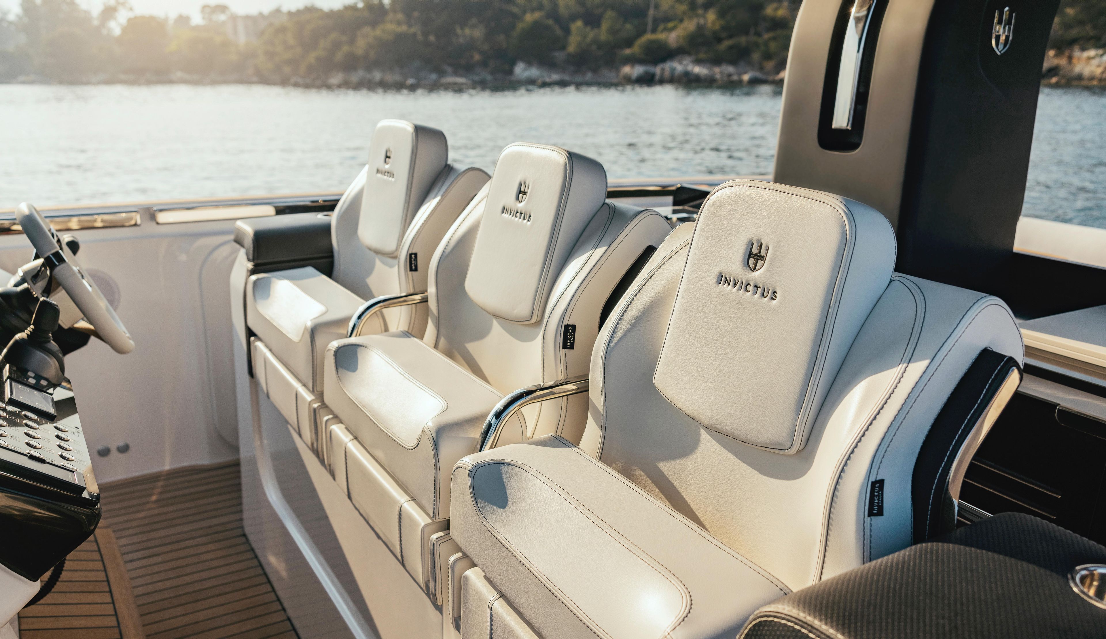 Luxurious seating on the 2025 Invictus TT420 yacht, featuring elegant design and premium materials.