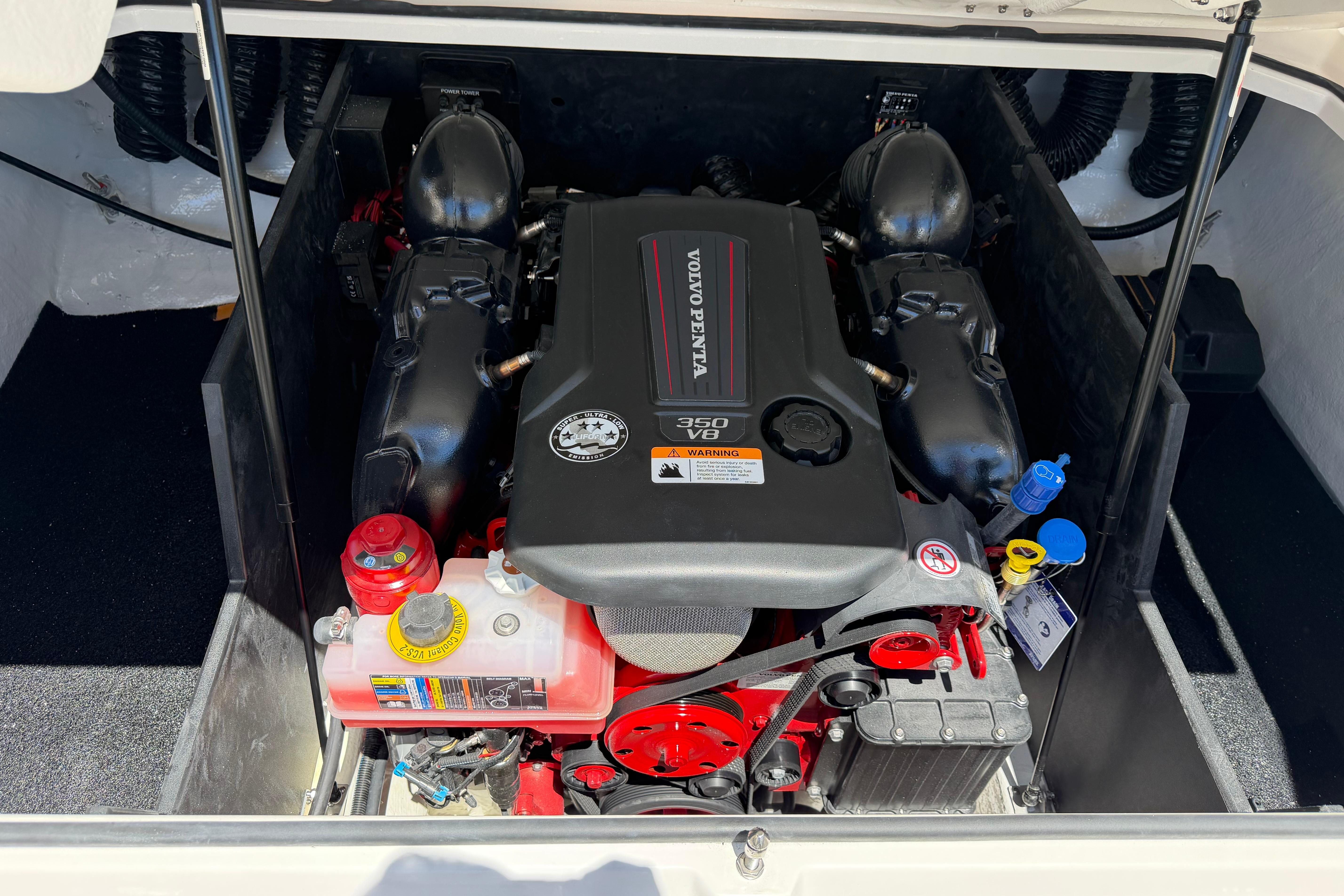 Engine compartment of a 2026 Regal LS4 boat featuring a Volvo Penta 350 V8 engine.