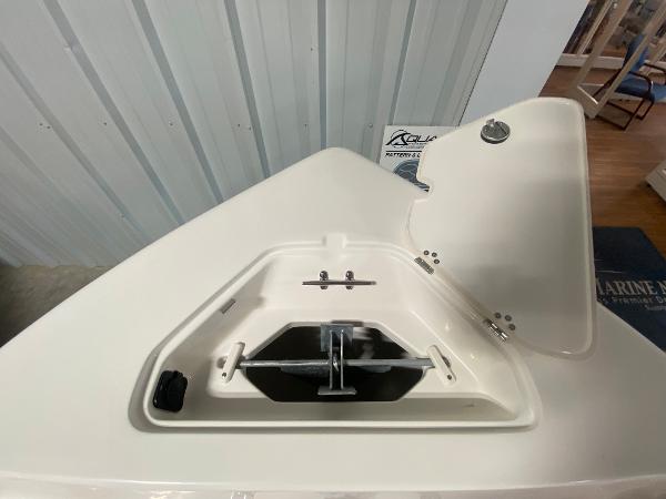 2024 Key West 189 FS boat anchor compartment with open hatch.