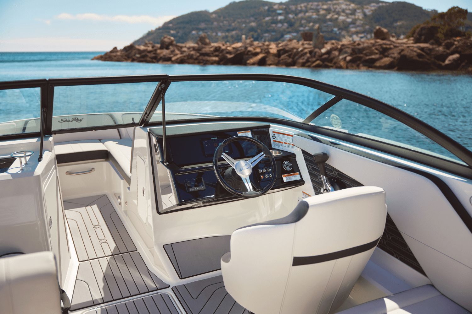 Interior of 2026 Sea Ray SPX 210 Outboard on water.