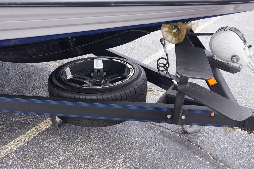 2020 Skeeter FXR21 Limited boat trailer with spare tire and winch system.