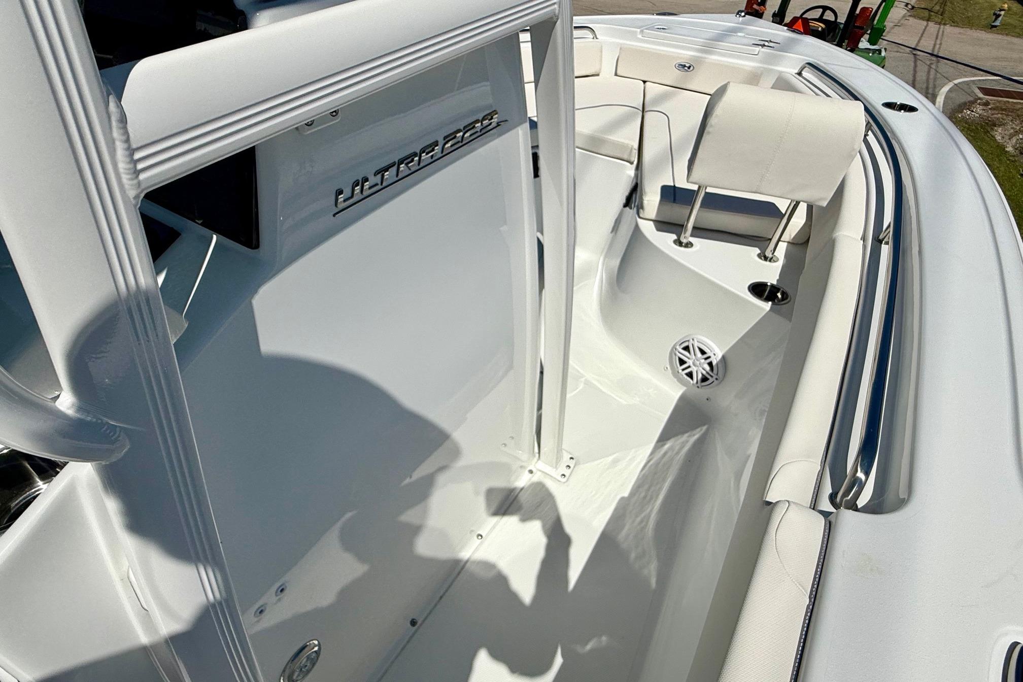 2026 Sea Hunt Ultra 229 boat interior with white seating and sleek design.