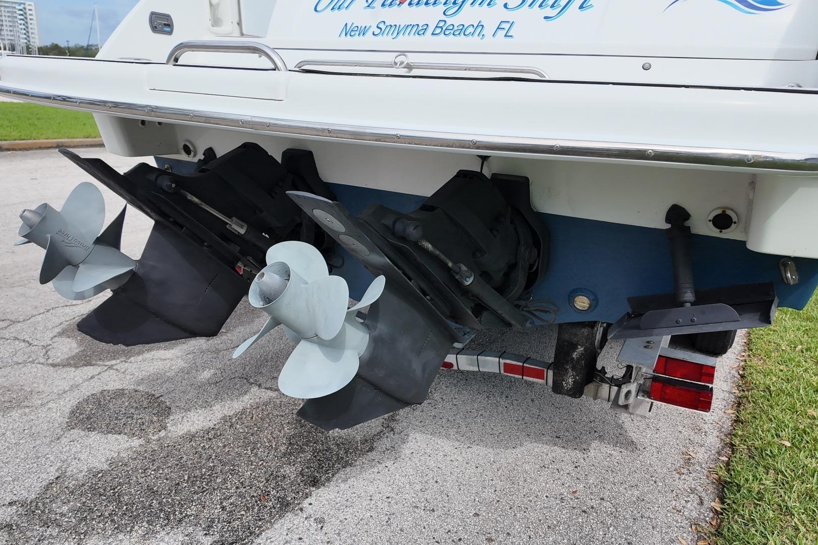 Rear view of 2007 Formula 330 Sun Sport boat with dual propellers.