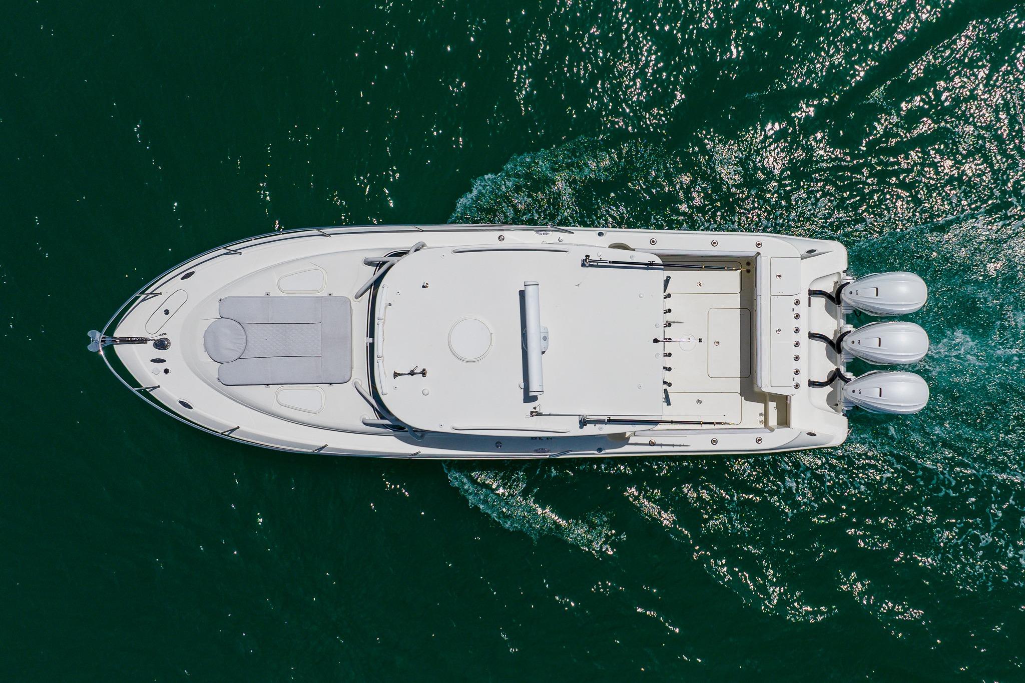 Aerial view of 2008 Hydra-Sports Vector 3500 VX boat cruising on water.