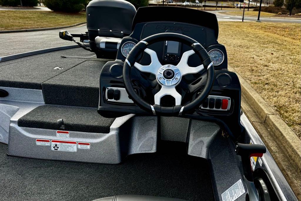 2026 Nitro Z17 boat dashboard with steering wheel and control panel.