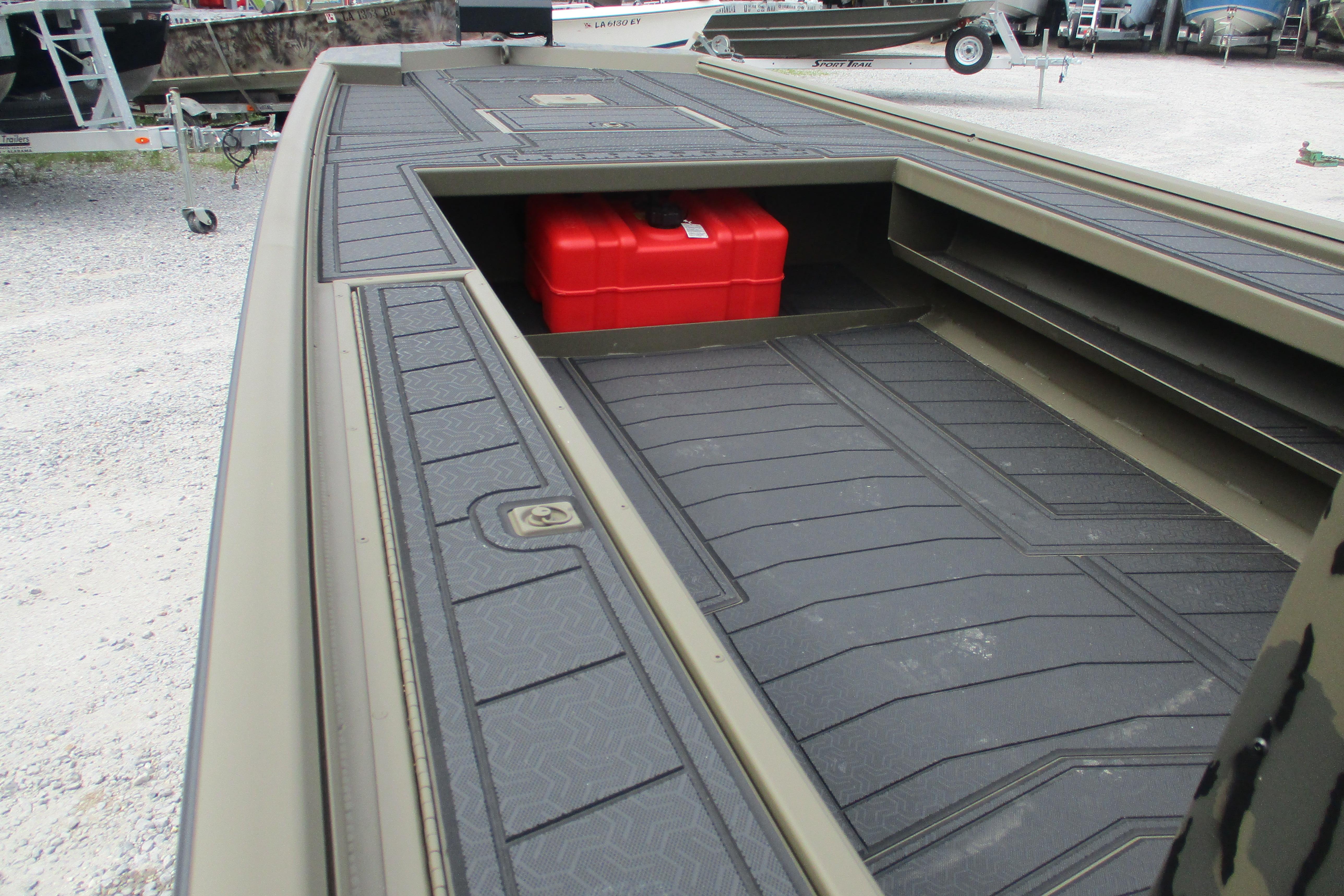 2026 Gator Tail 2060 Extreme CC boat with storage compartment and red fuel tank.