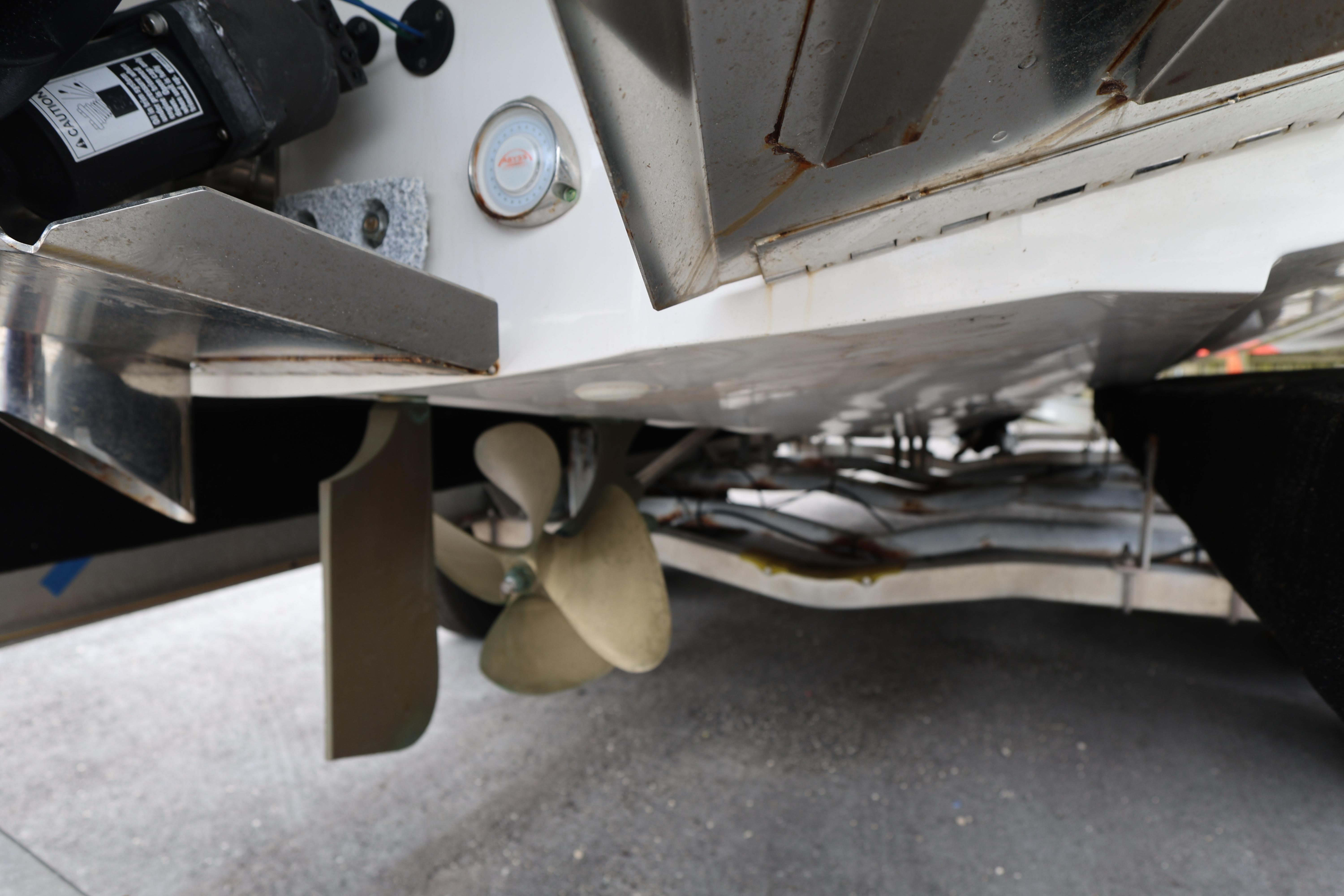 2023 MasterCraft X24 boat propeller and underside detail.