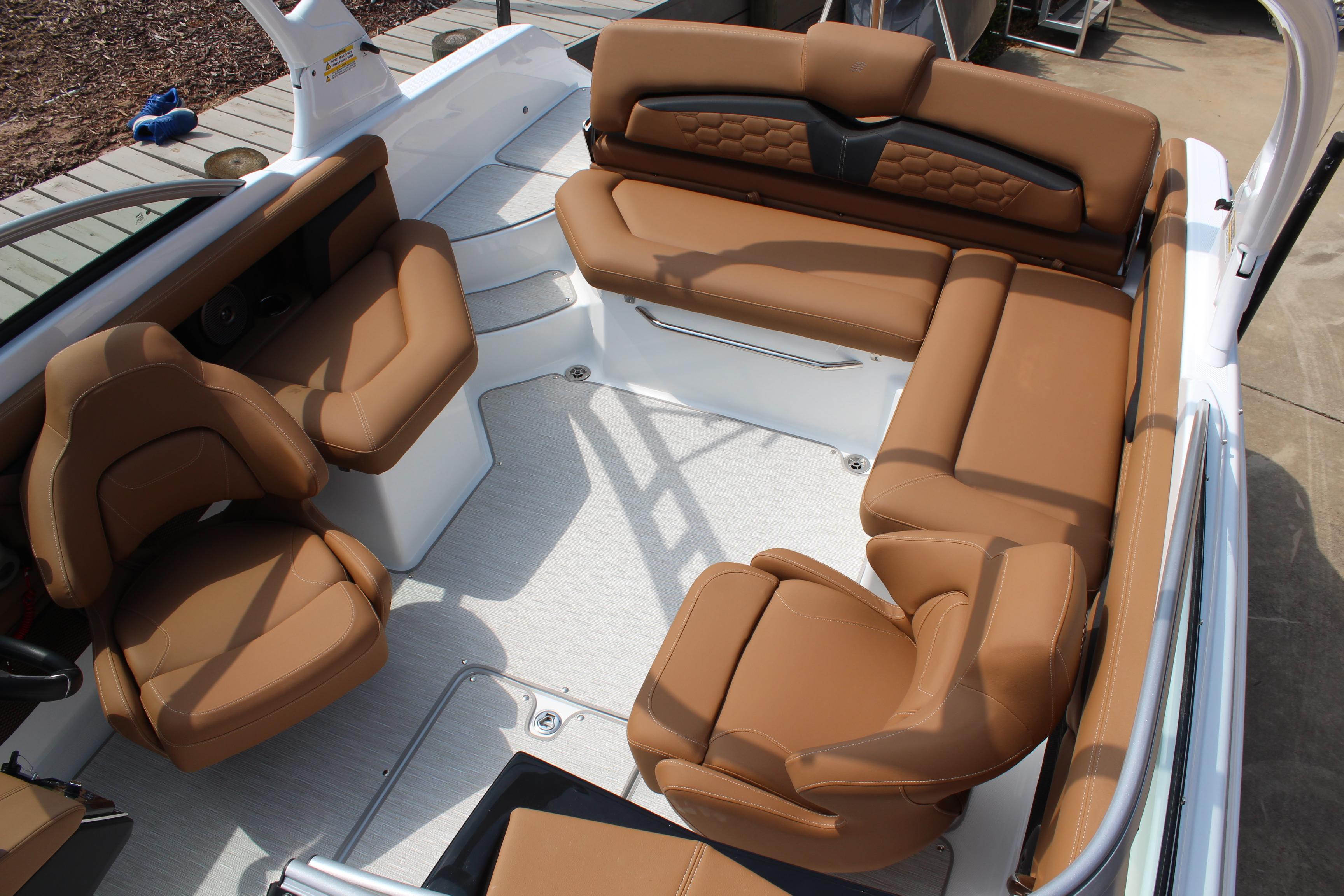 2025 Four Winns HD3 OB boat interior with luxurious brown seating and modern design.