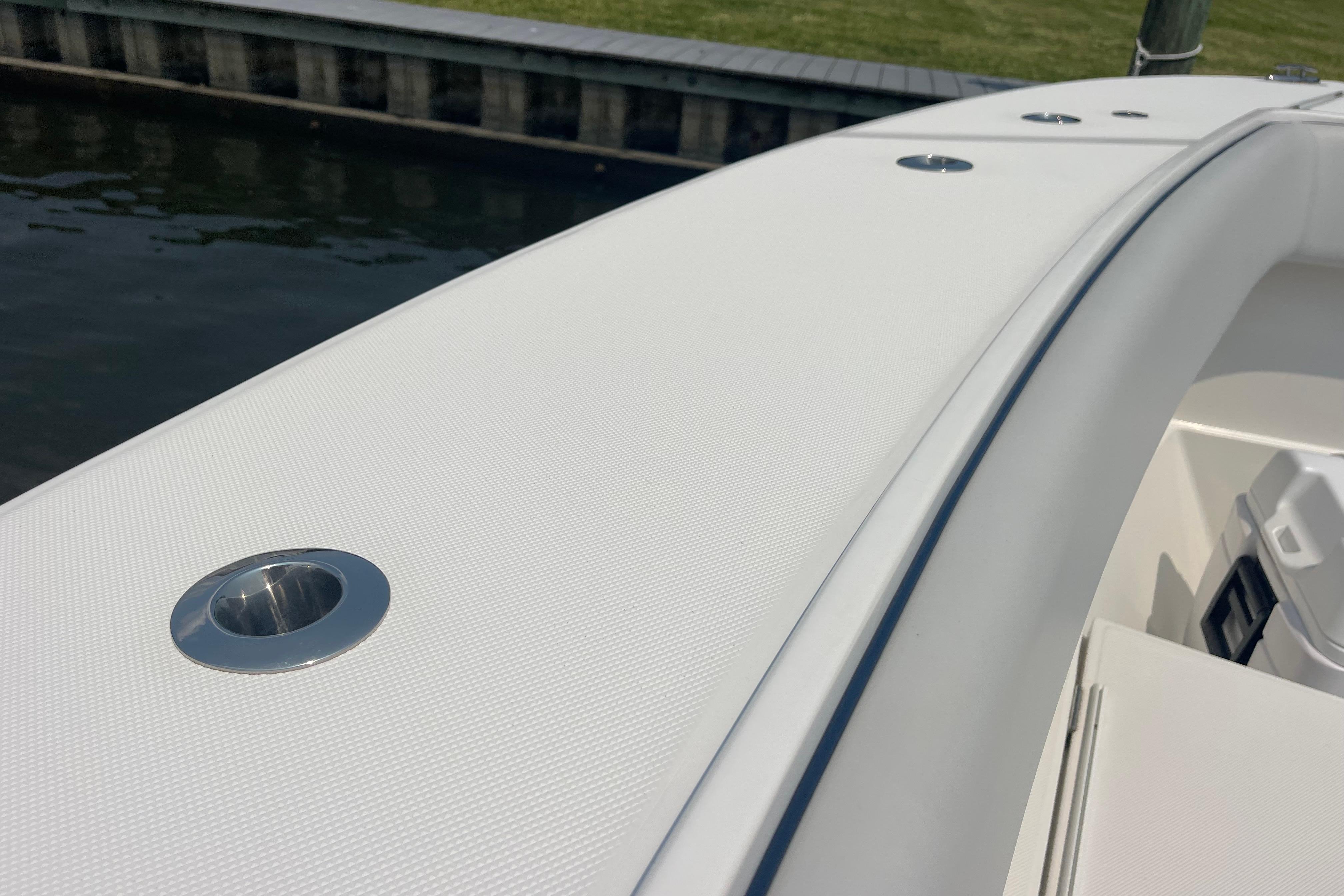 2020 Jupiter 38 boat deck with stainless steel fittings, dockside view.