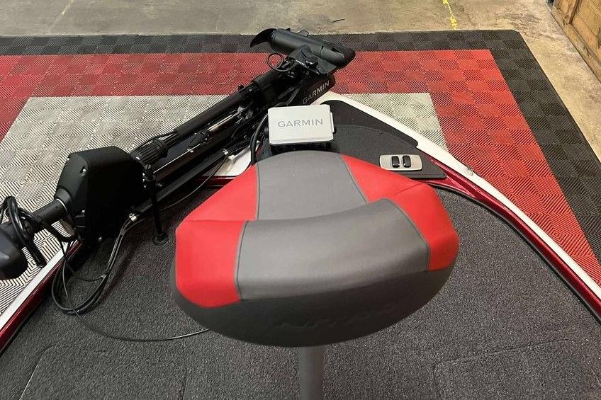 Red and gray seat on a 2026 Nitro Z18 Pro boat with Garmin equipment.