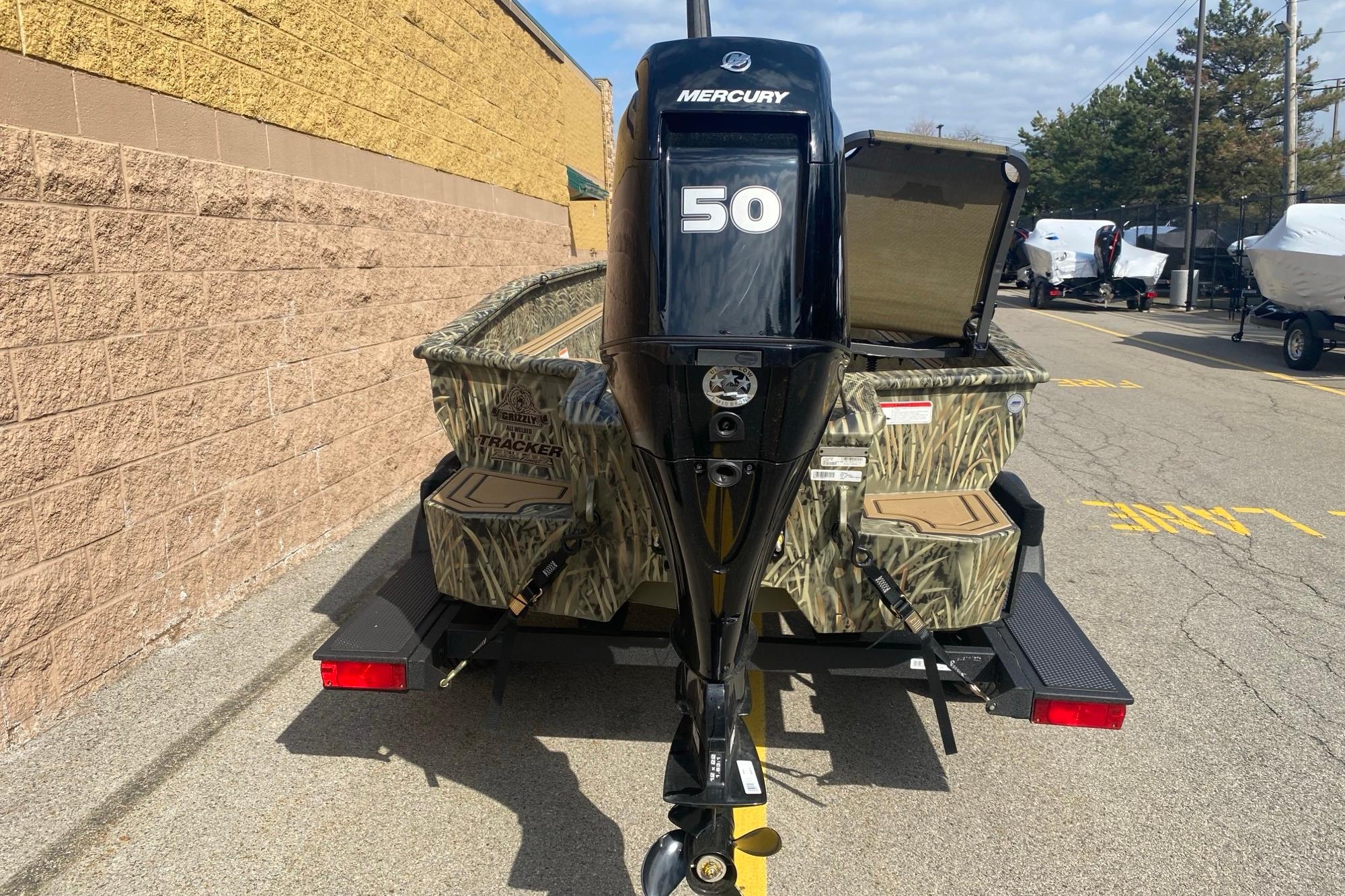 2026 Tracker Grizzly 1650 T Prairie Wings Edition boat with Mercury 50 engine.