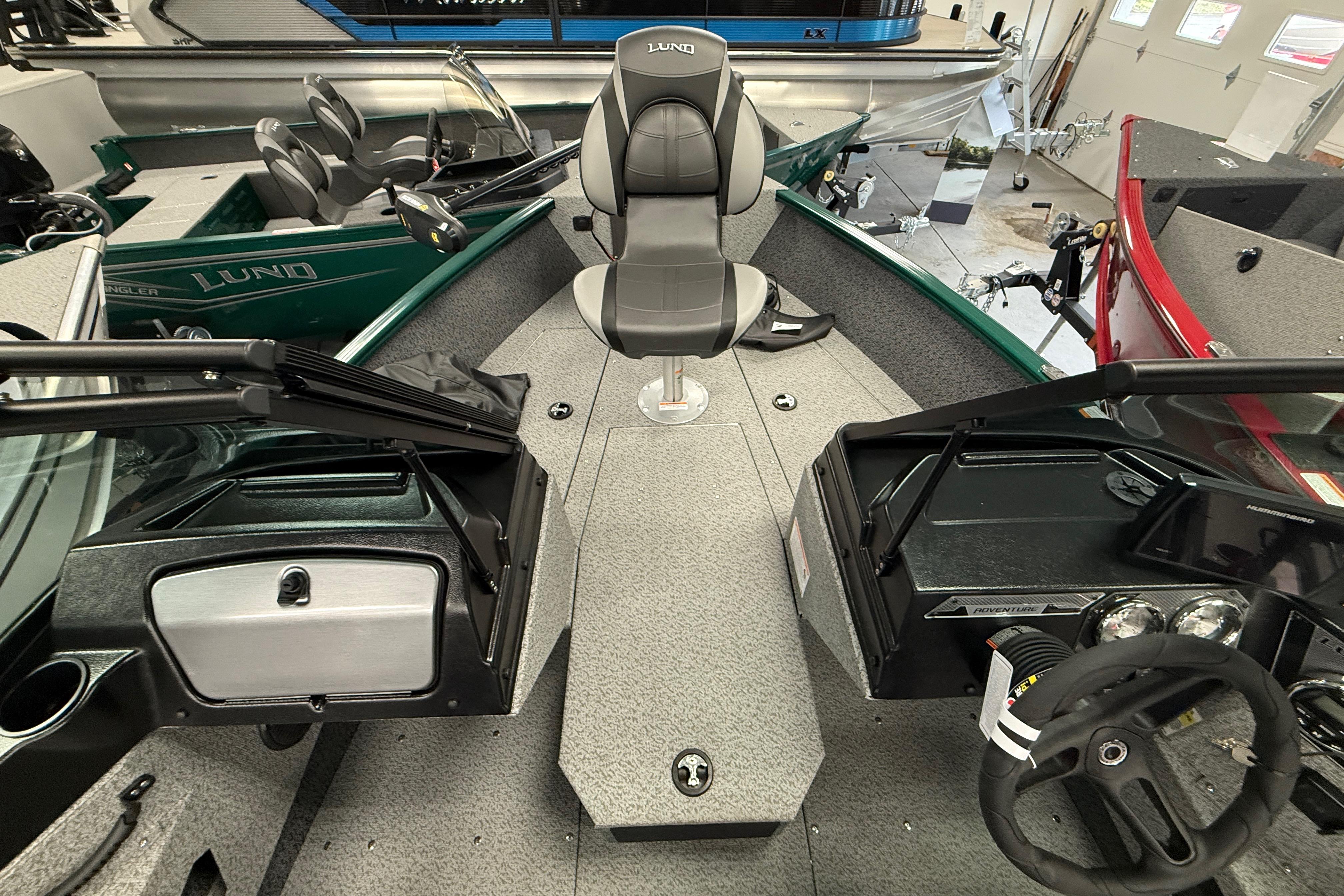 2026 Lund 1775 Adventure Sport boat interior with seating and dashboard view.
