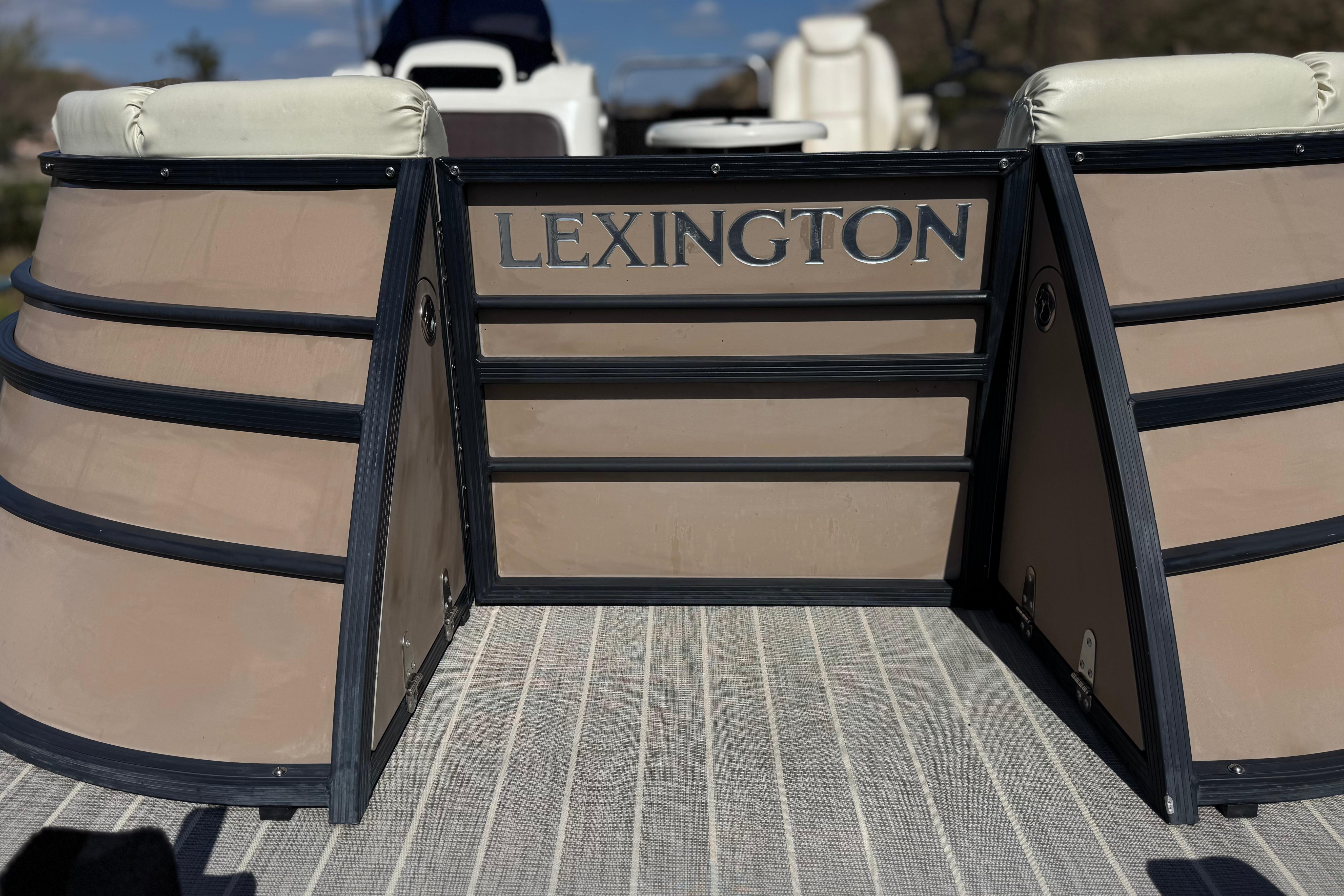 2023 Lexington 623 ST Xtreme boat deck with beige seating and logo.