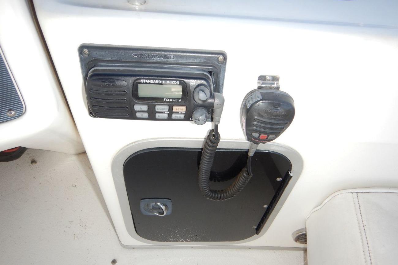 1991 Sea Ray 370 Sedan Bridge radio equipment with Standard Horizon Eclipse+ VHF.
