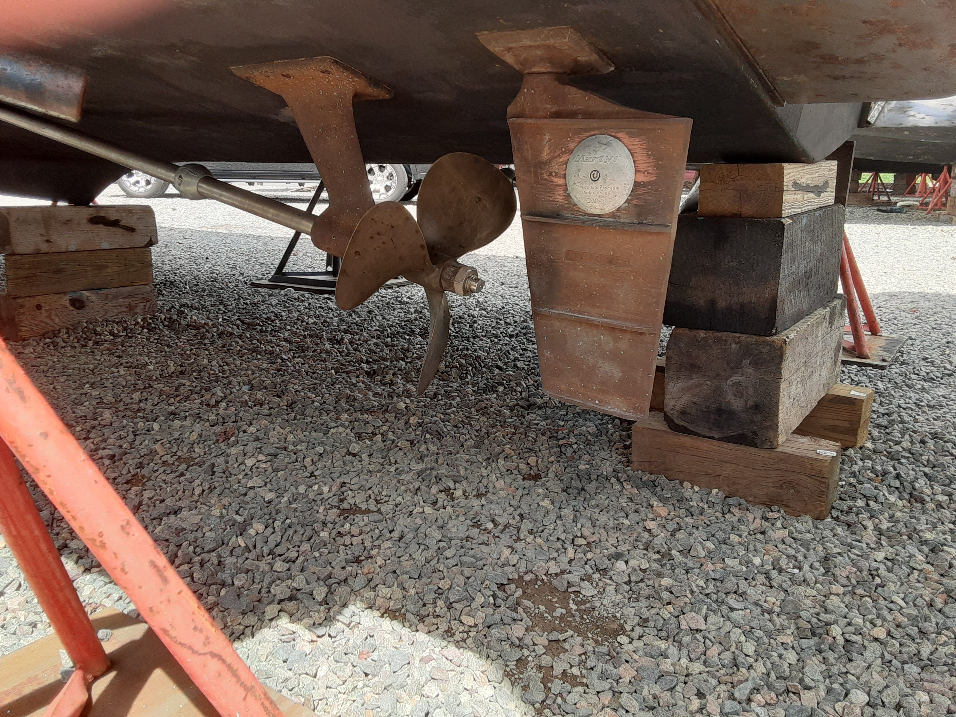 Underside of a 1985 Tiara Yachts 3100 Open on blocks.