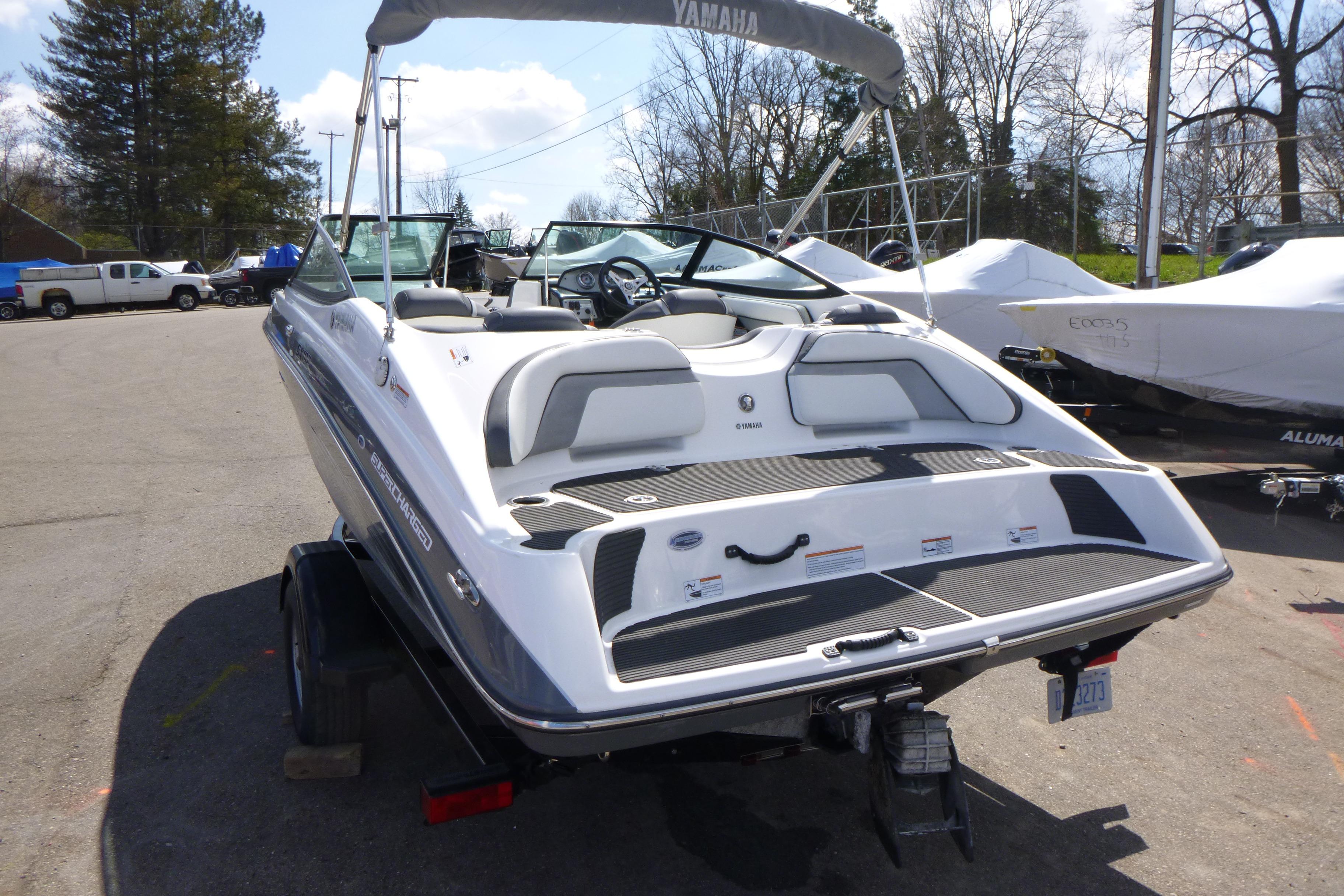 2015 Yamaha Boats SX192 parked outdoors on a trailer.