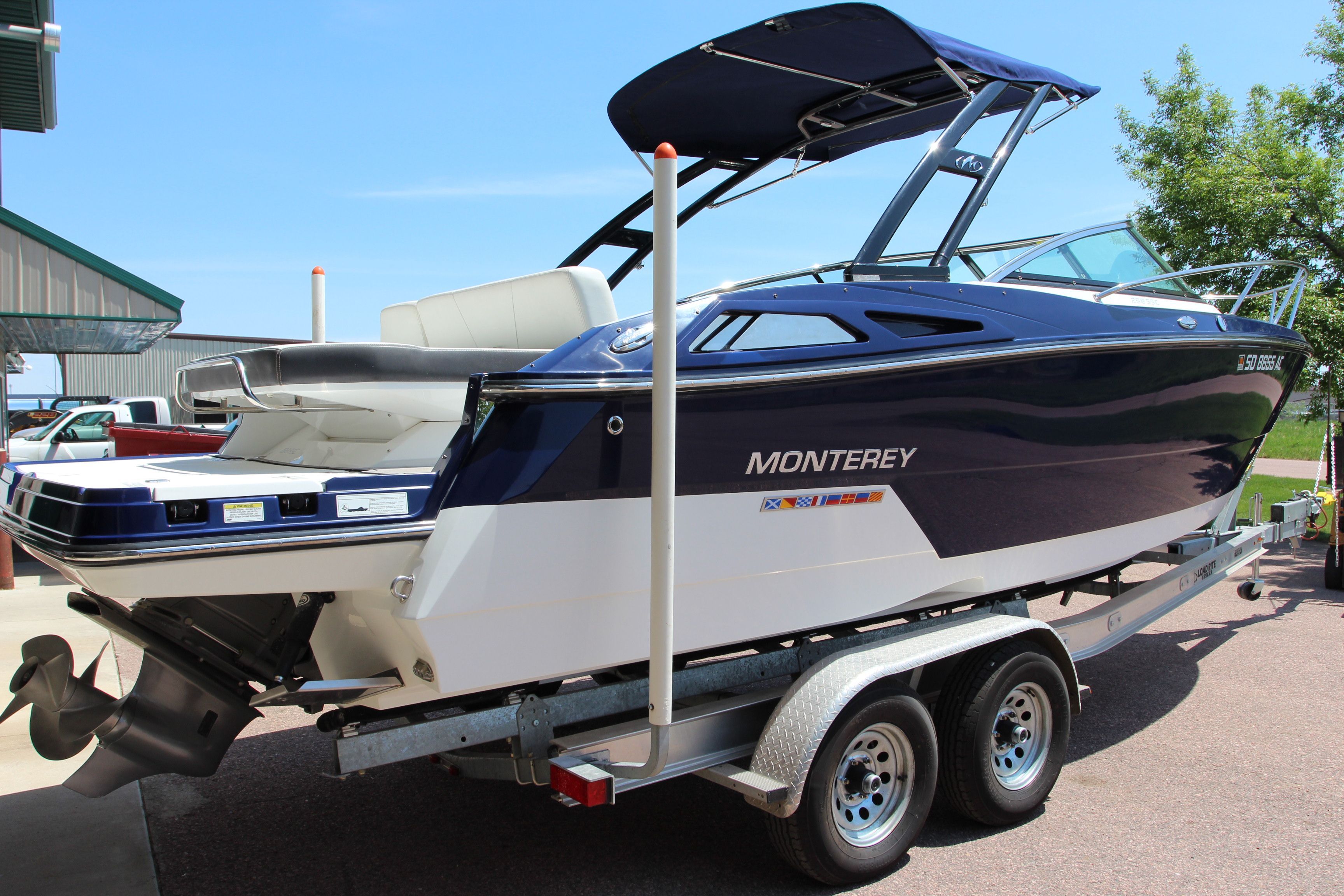 2015 Monterey 268SSC boat on trailer, side view.