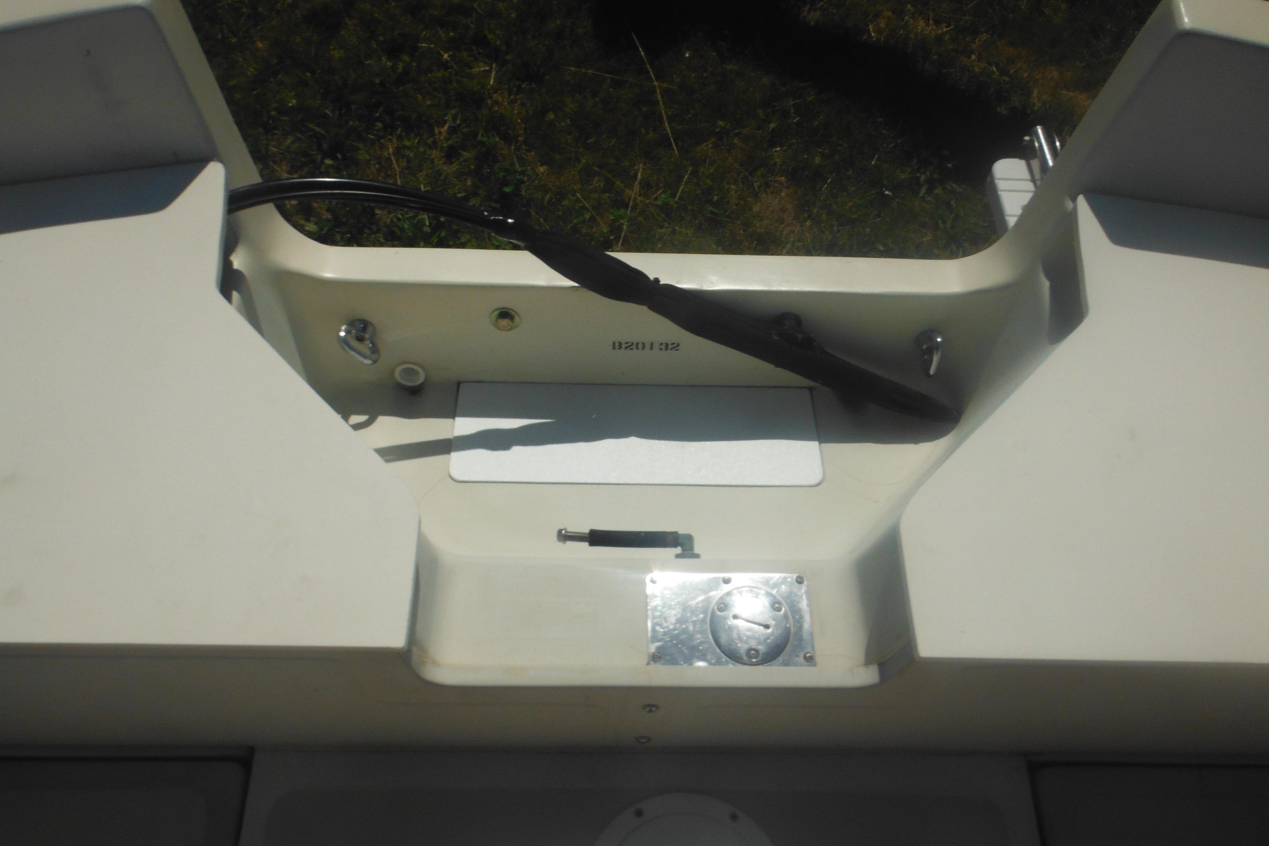 1991 Boston Whaler 16 SL boat interior detail with steering components.