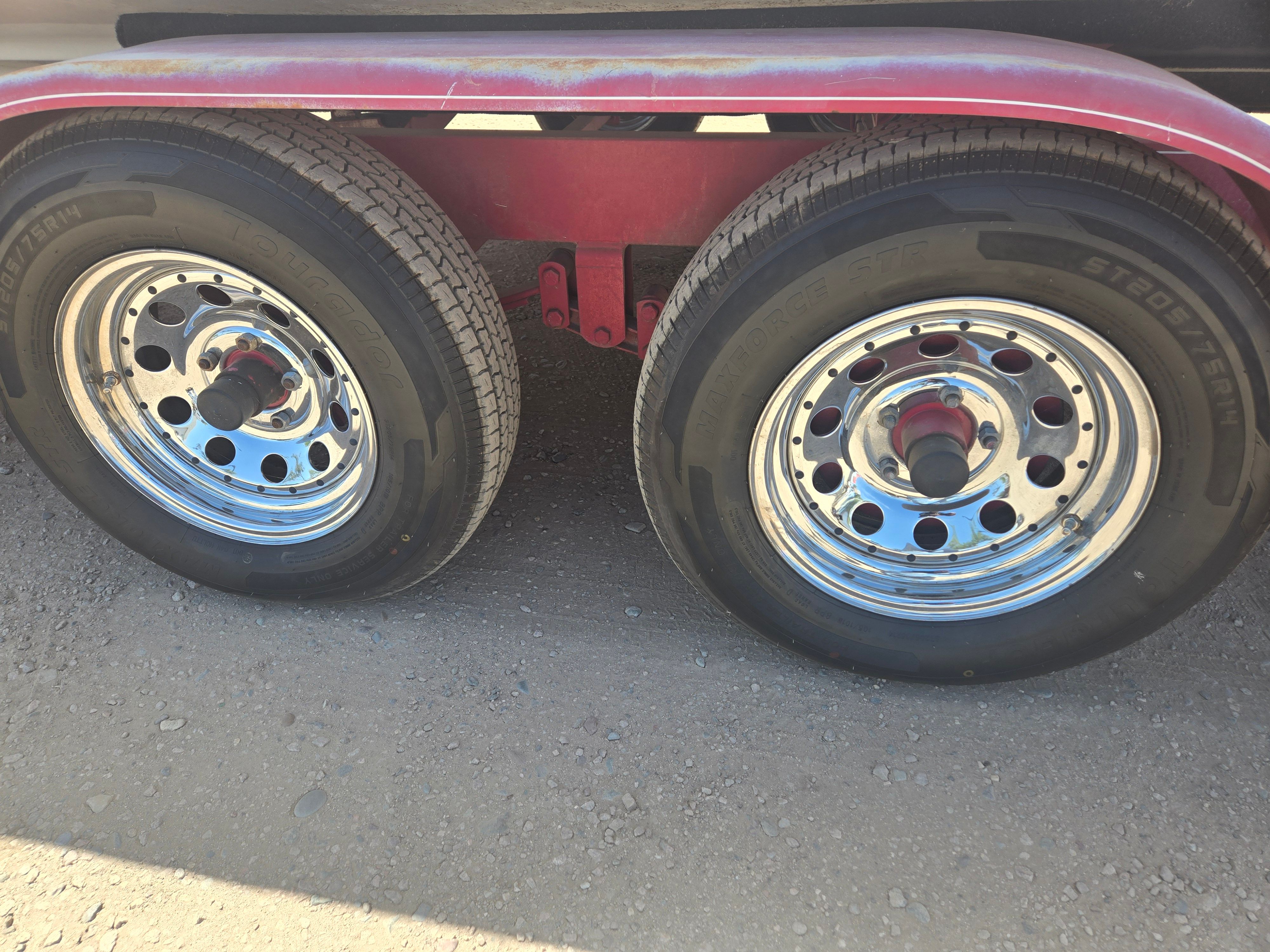 Dual trailer wheels on a 2001 Chaparral Sunesta 233.