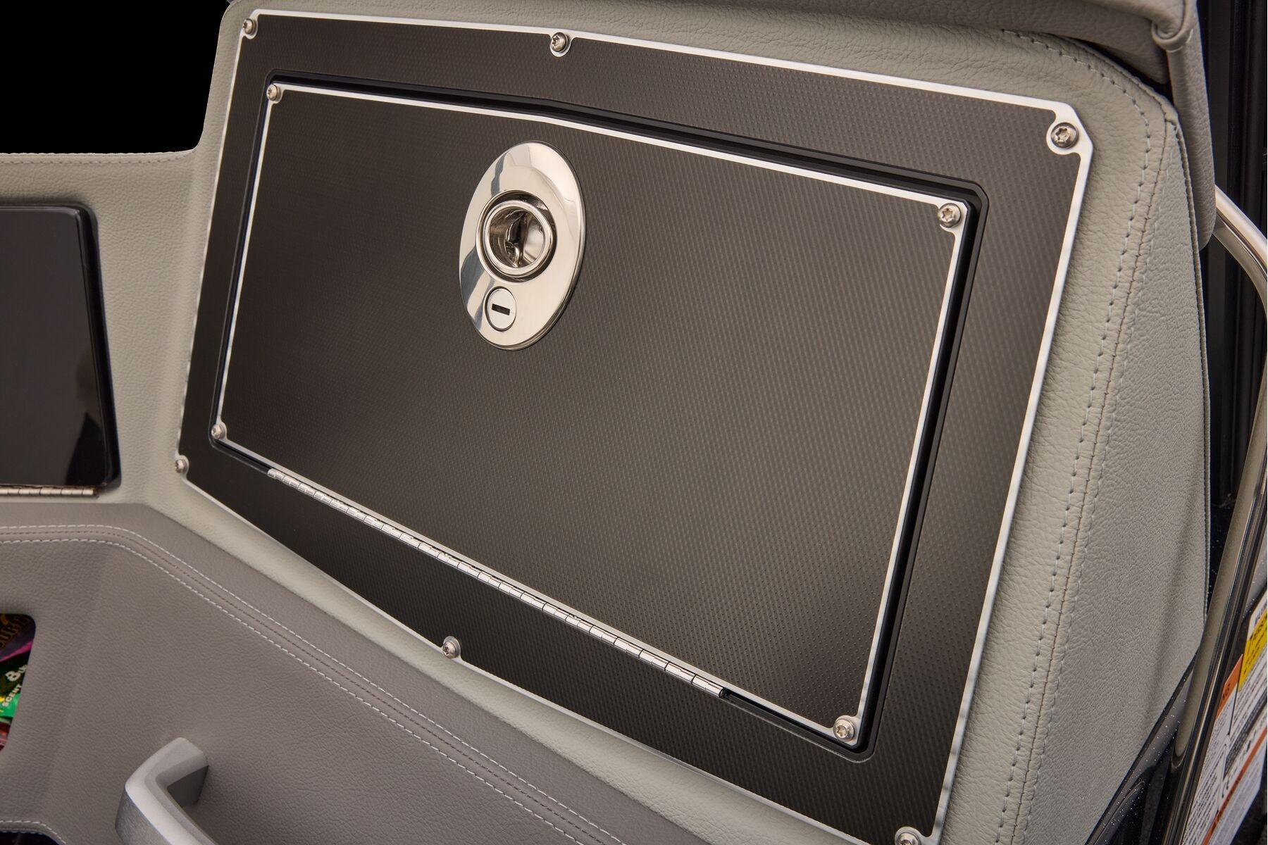 Manufacturer Provided Image: 2026 Ranger 620xFS Pro boat dashboard with sleek black panel and secure lock.