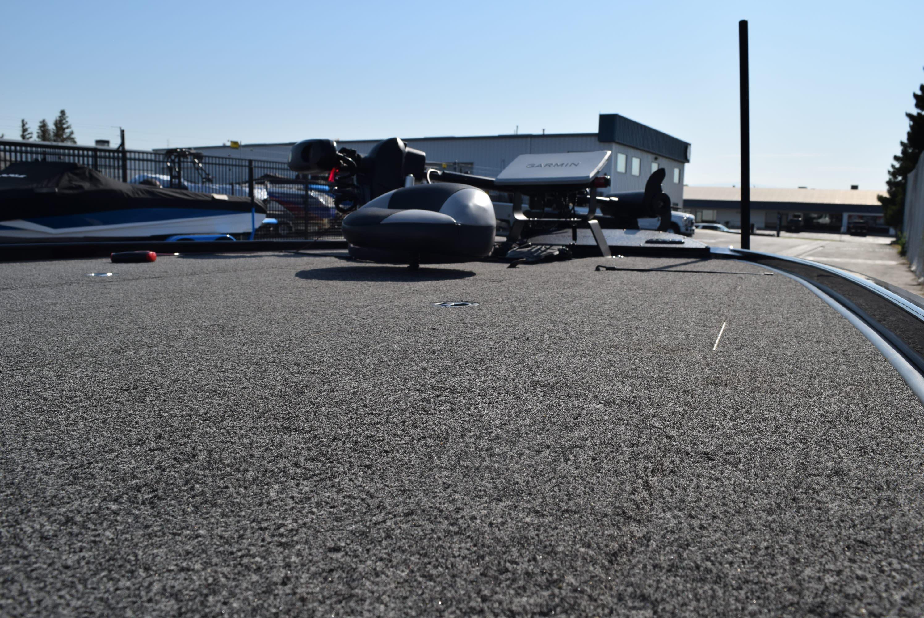 2025 Nitro Z20 XL Pro boat deck with Garmin equipment, outdoor setting.