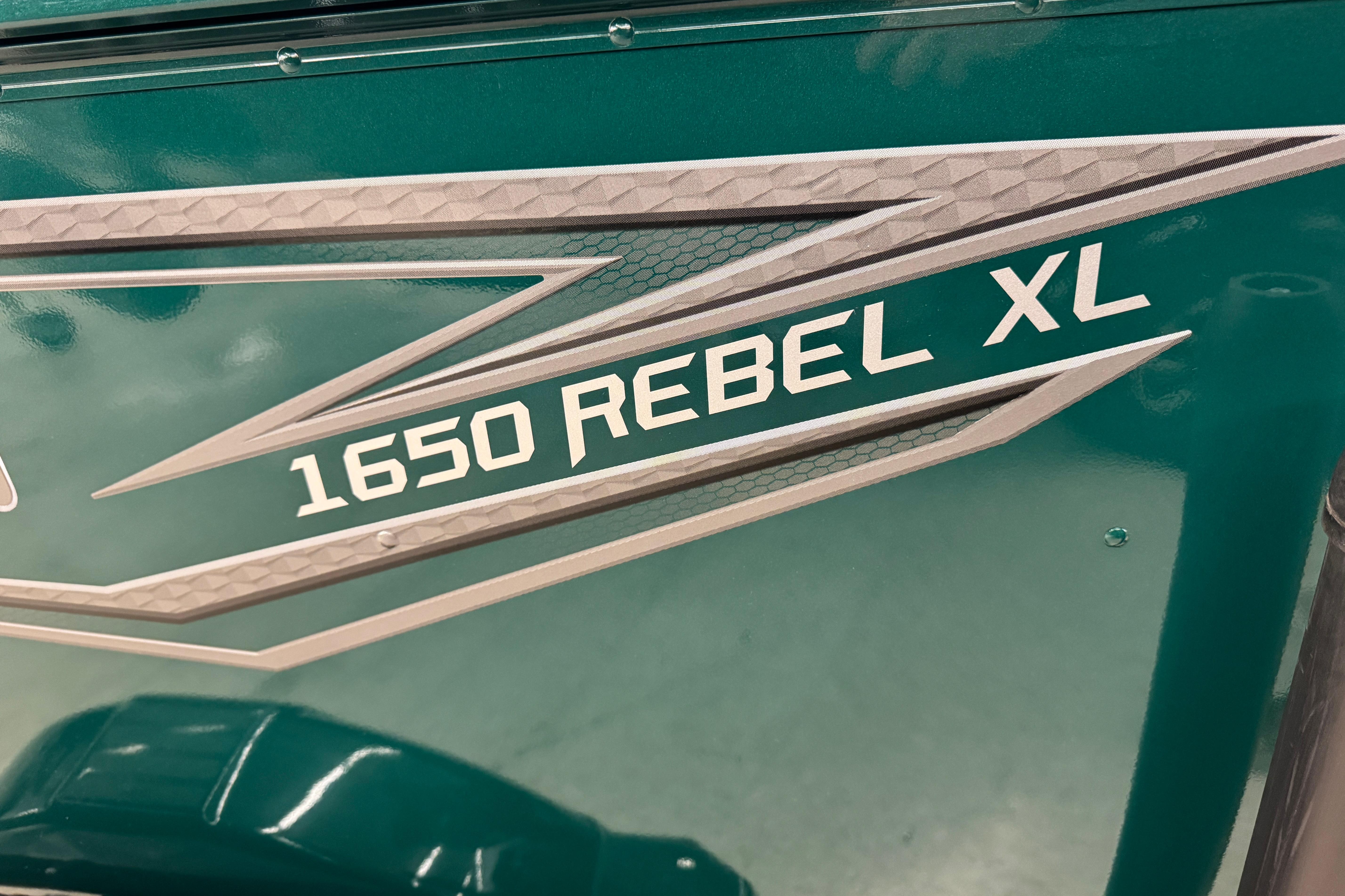 2026 Lund 1650 Rebel XL Sport boat logo on teal background.