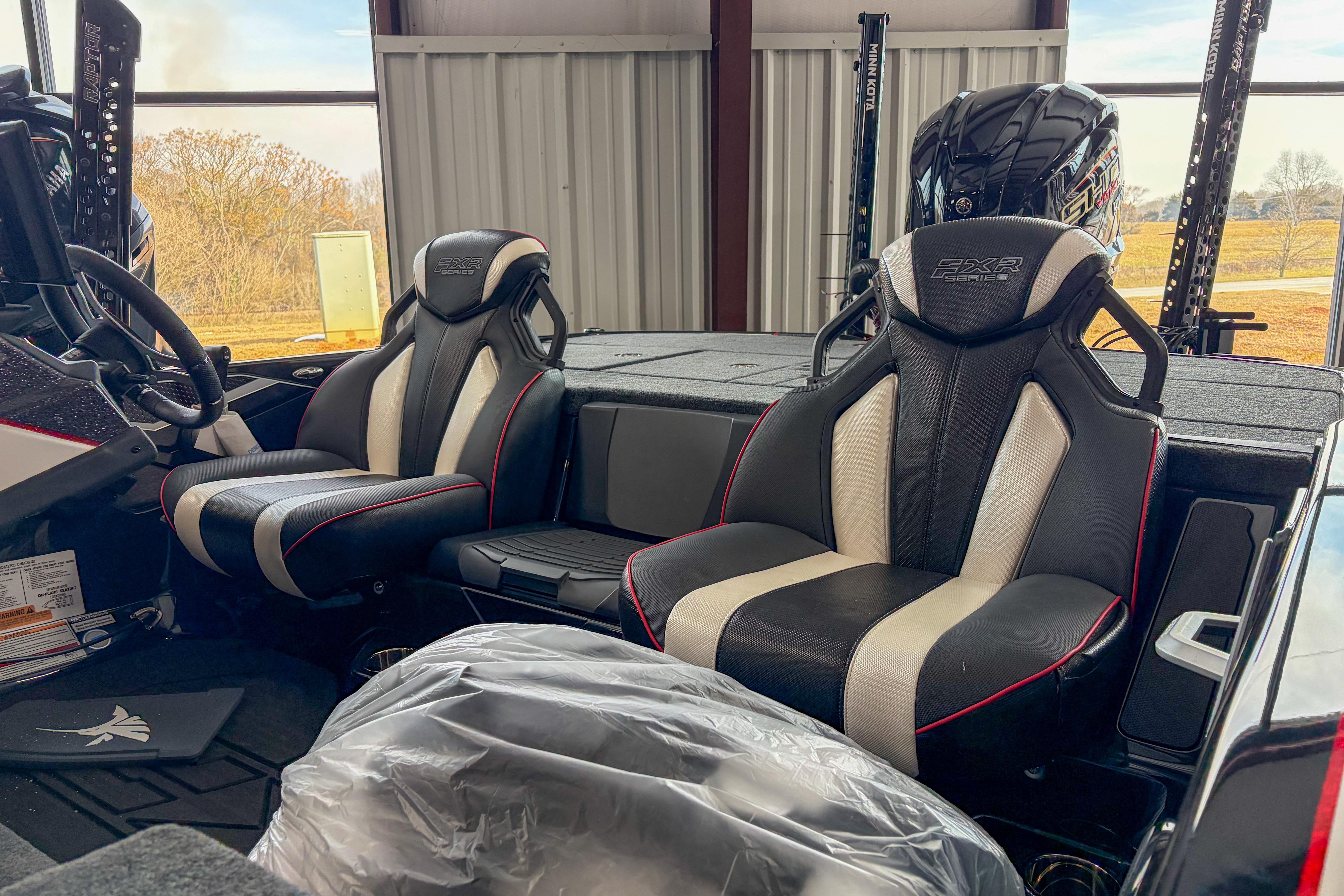 2026 Skeeter FXR20 FLEX boat interior with dual black and white seats.