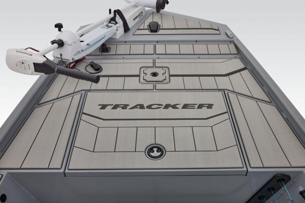 2026 Tracker Bass Tracker Classic CC boat deck with trolling motor, featuring sleek design and branding.