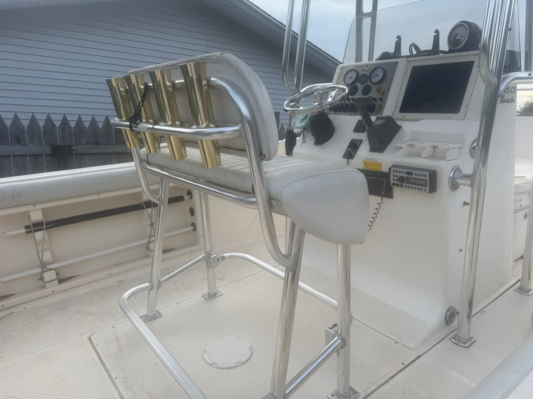 2007 Key West Blue Water 225 boat console with steering wheel and controls.