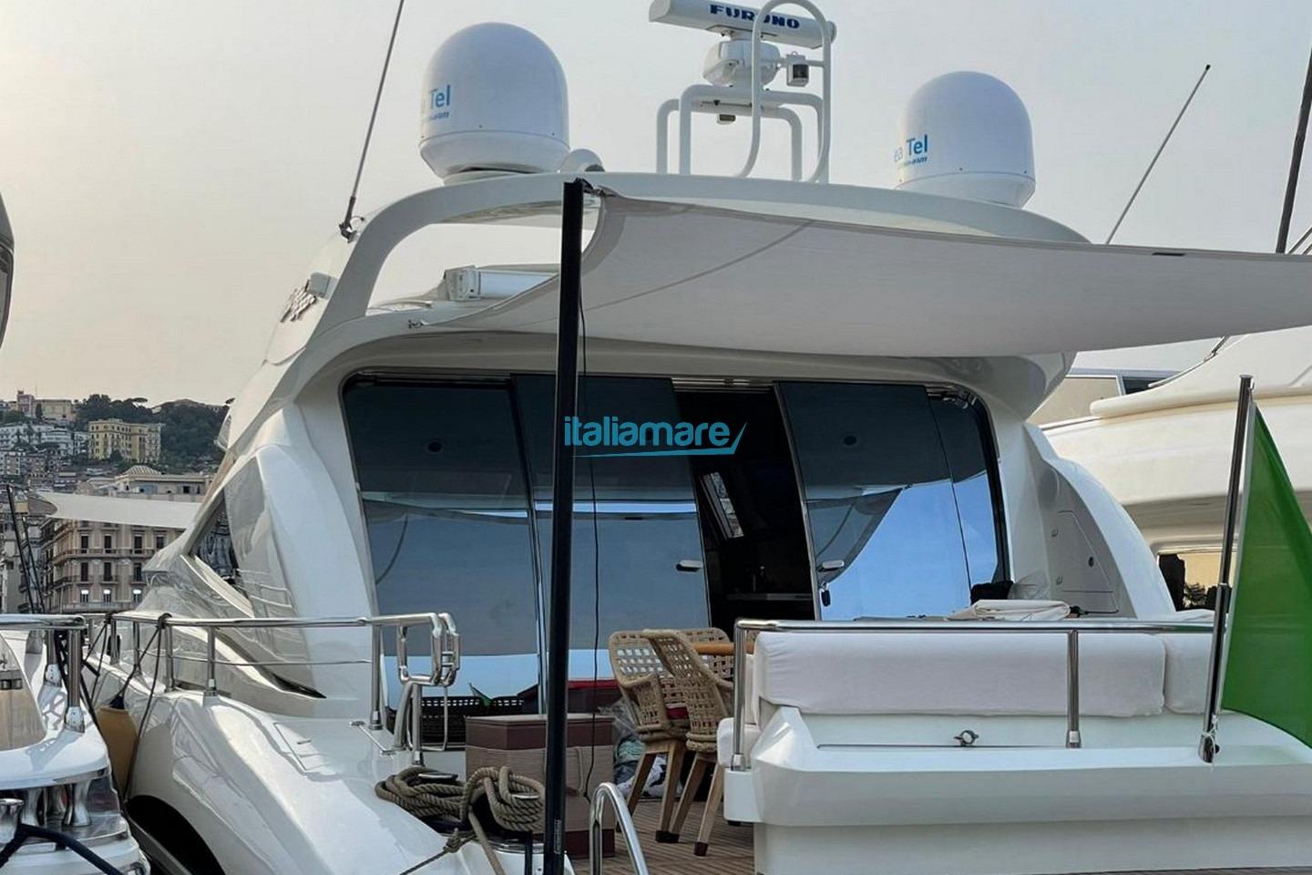 2025 Alalunga Open 85 Sport X yacht docked, showcasing sleek design and modern amenities.