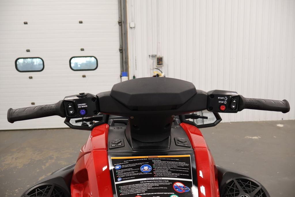 2026 Yamaha WaveRunner VX Deluxe handlebars and controls in a garage setting.