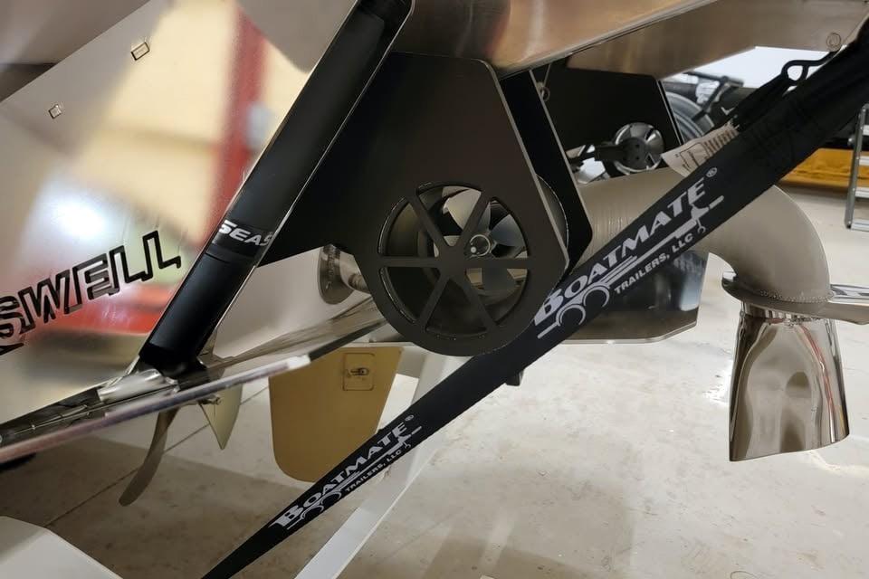 2023 Supra SE 550 boat trailer detail with Boatmate strap and propeller.