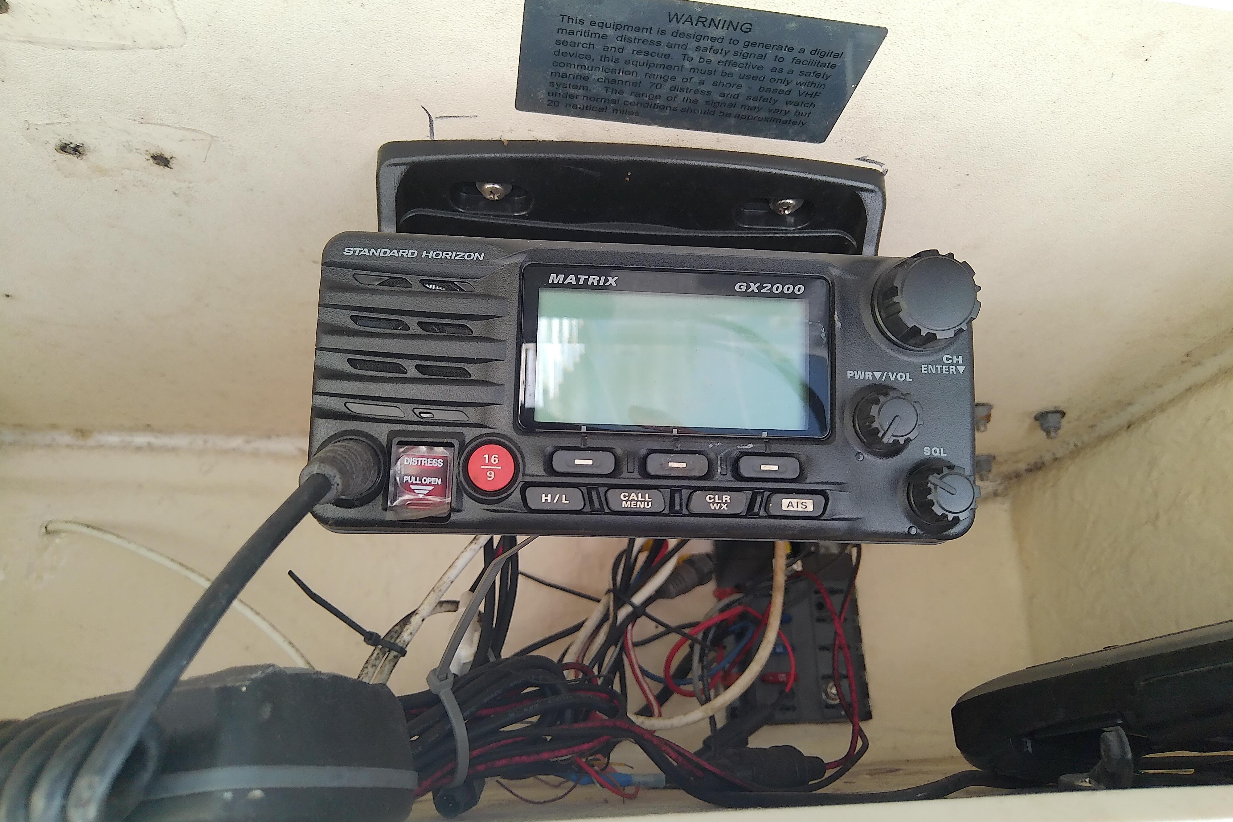 VHF radio system on 1995 Grady-White Sailfish 272 boat dashboard.
