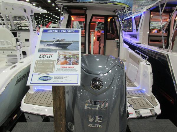 2025 Cutwater C-248 Coupe boat displayed at a show, featuring a 250 V6 engine.