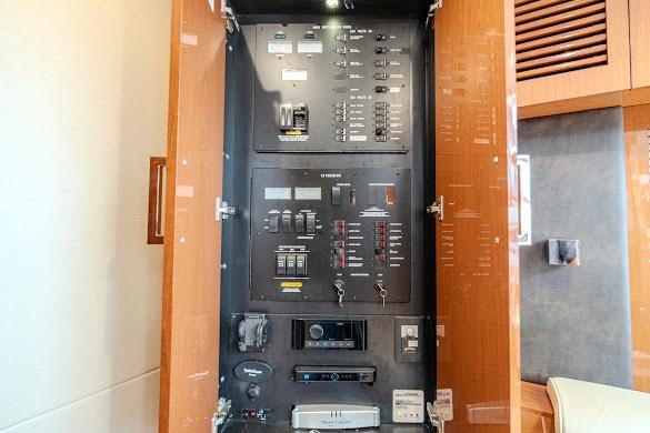 Electrical panel inside 2016 Sea Ray Sundancer 510 yacht, showcasing controls and switches.