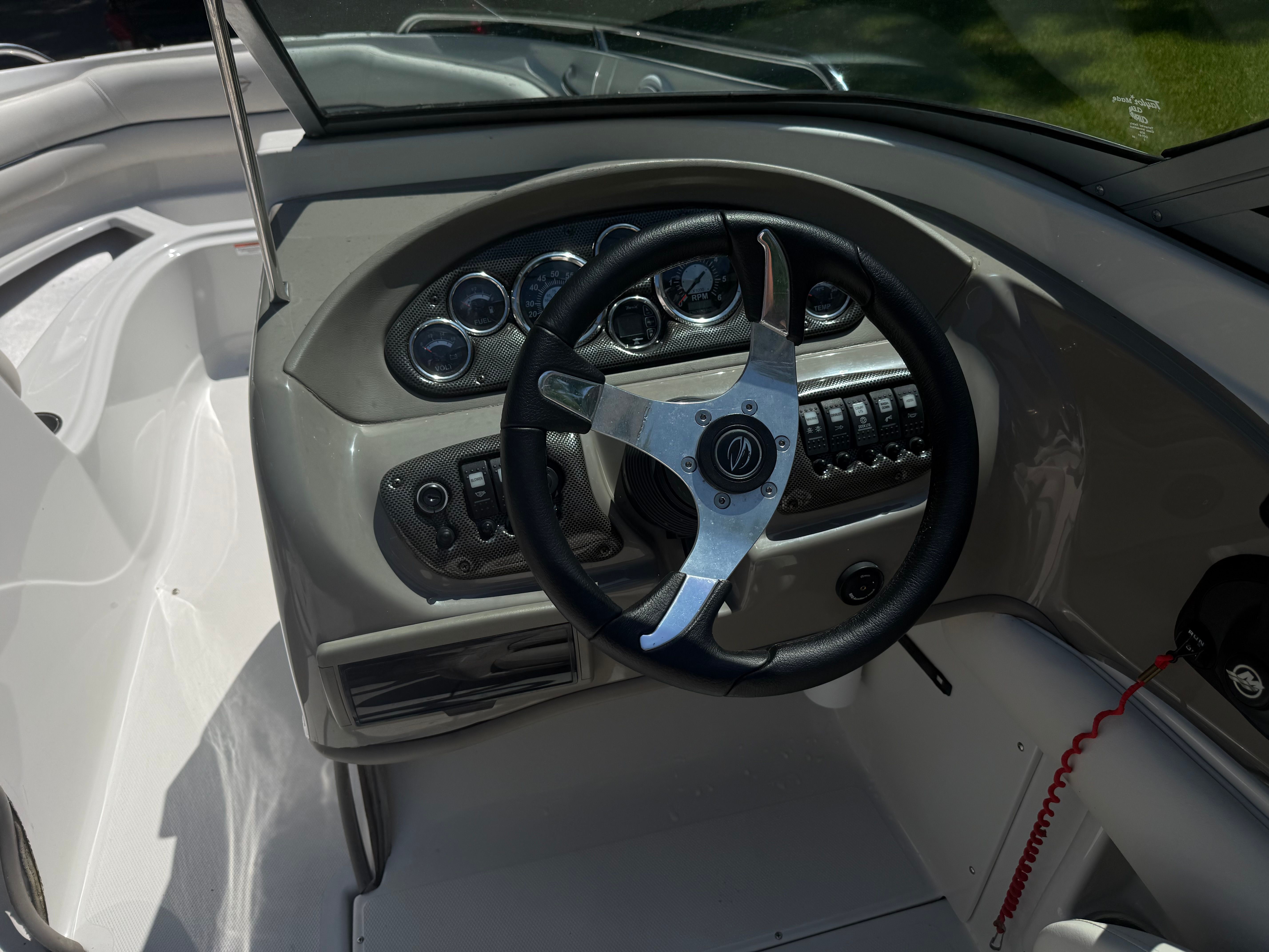 Interior view of 2008 Crownline 210 LX boat cockpit.