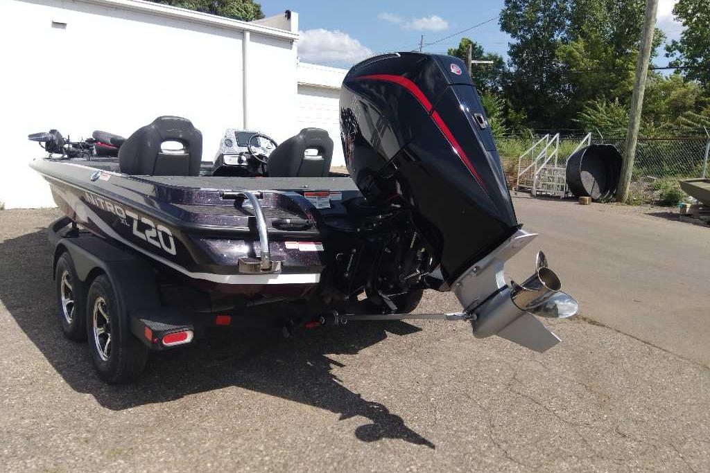 2026 Nitro Z20 XL Pro boat with powerful outboard motor, parked outdoors.