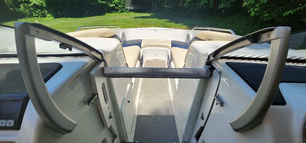 Interior view of a 2007 Sea-Doo sport boat with seating area and cushioned seats.