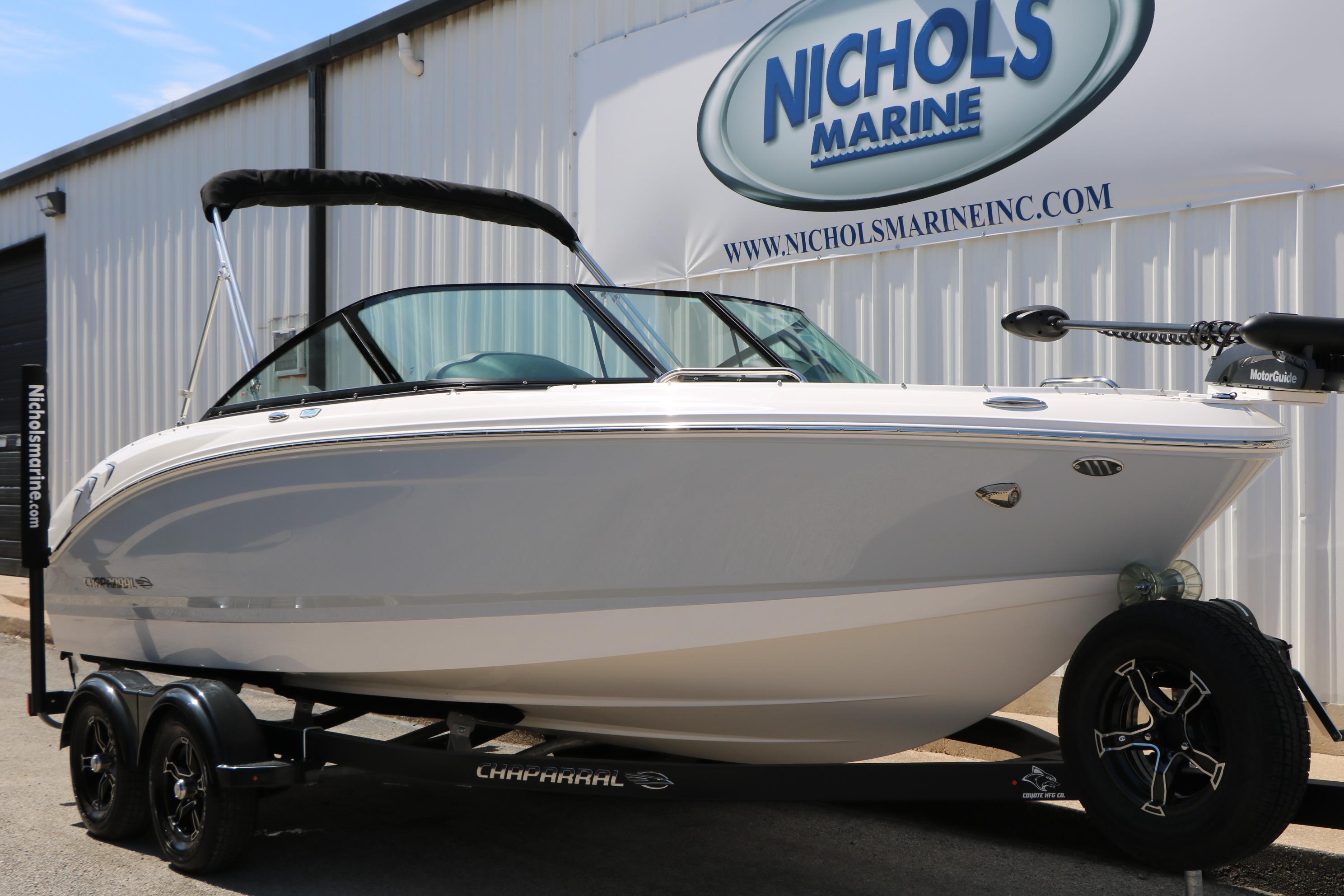 2025 Chaparral 21 SSi Ski & Fish boat on trailer at Nichols Marine.