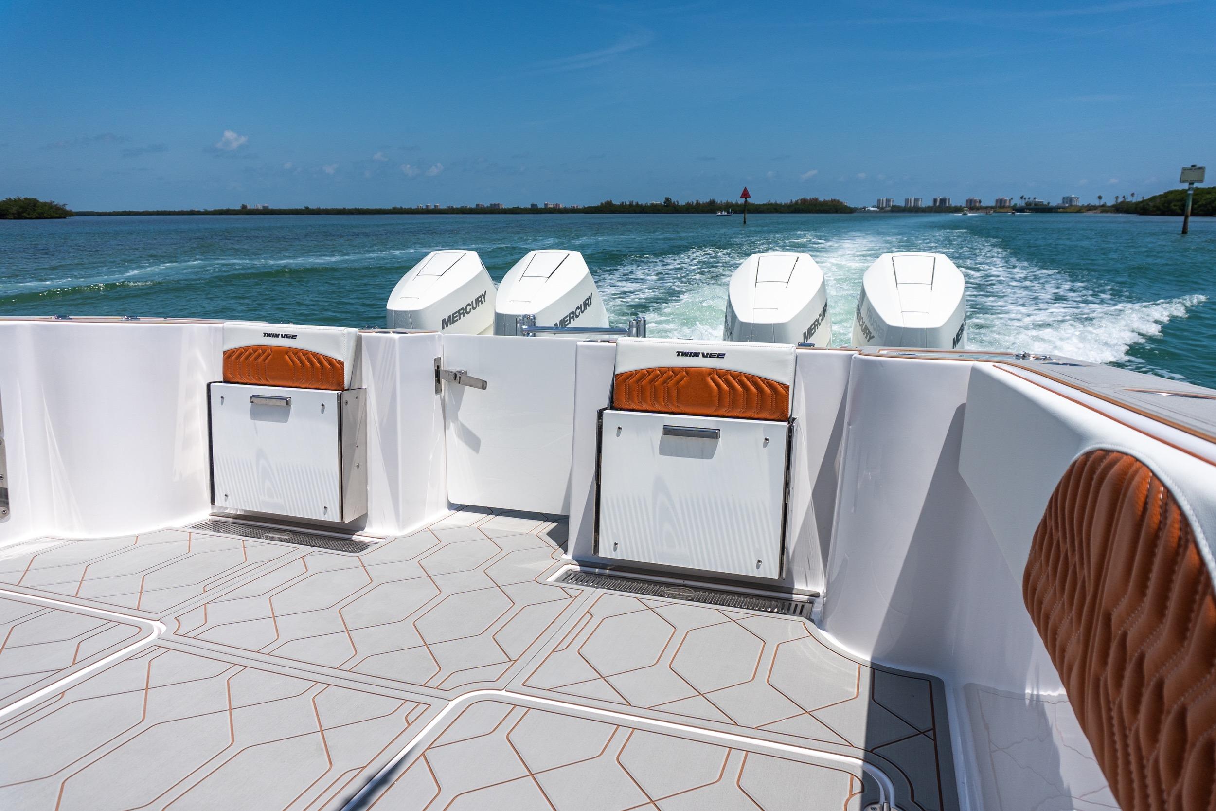 Twin Vee 400 GFX2 CC 2026 boat with Mercury engines cruising on open water.