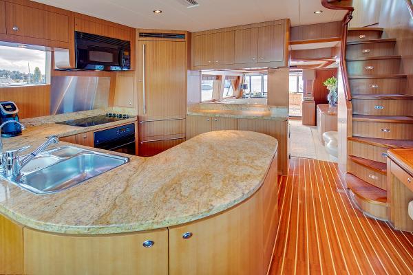Luxurious kitchen on a 2006 Horizon 82’ Cockpit Motoryacht.
