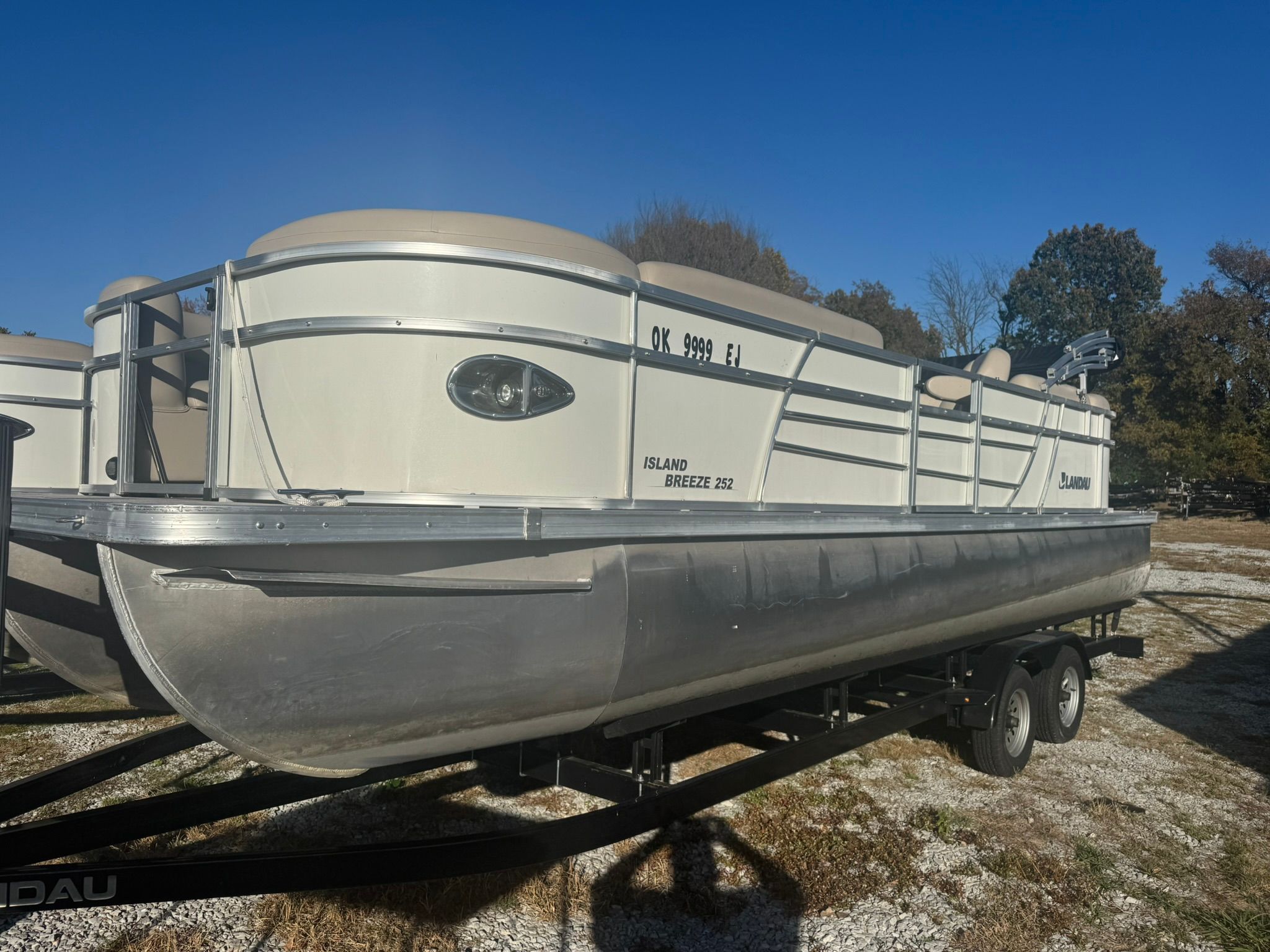 2024 Landau 252 Island Breeze pontoon boat on trailer.