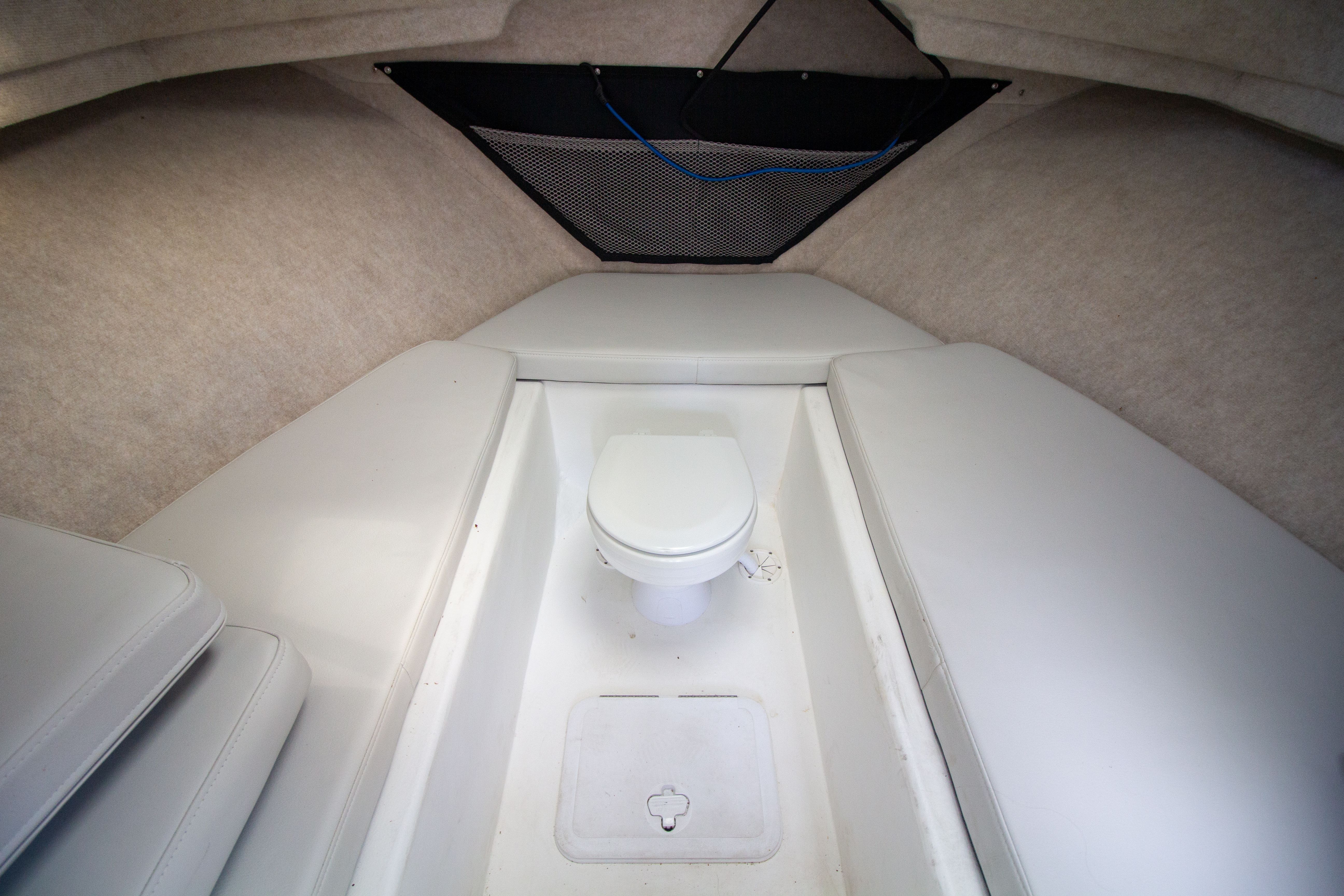 Interior of 2022 Parker 2520 XLD Sport Cabin with toilet.