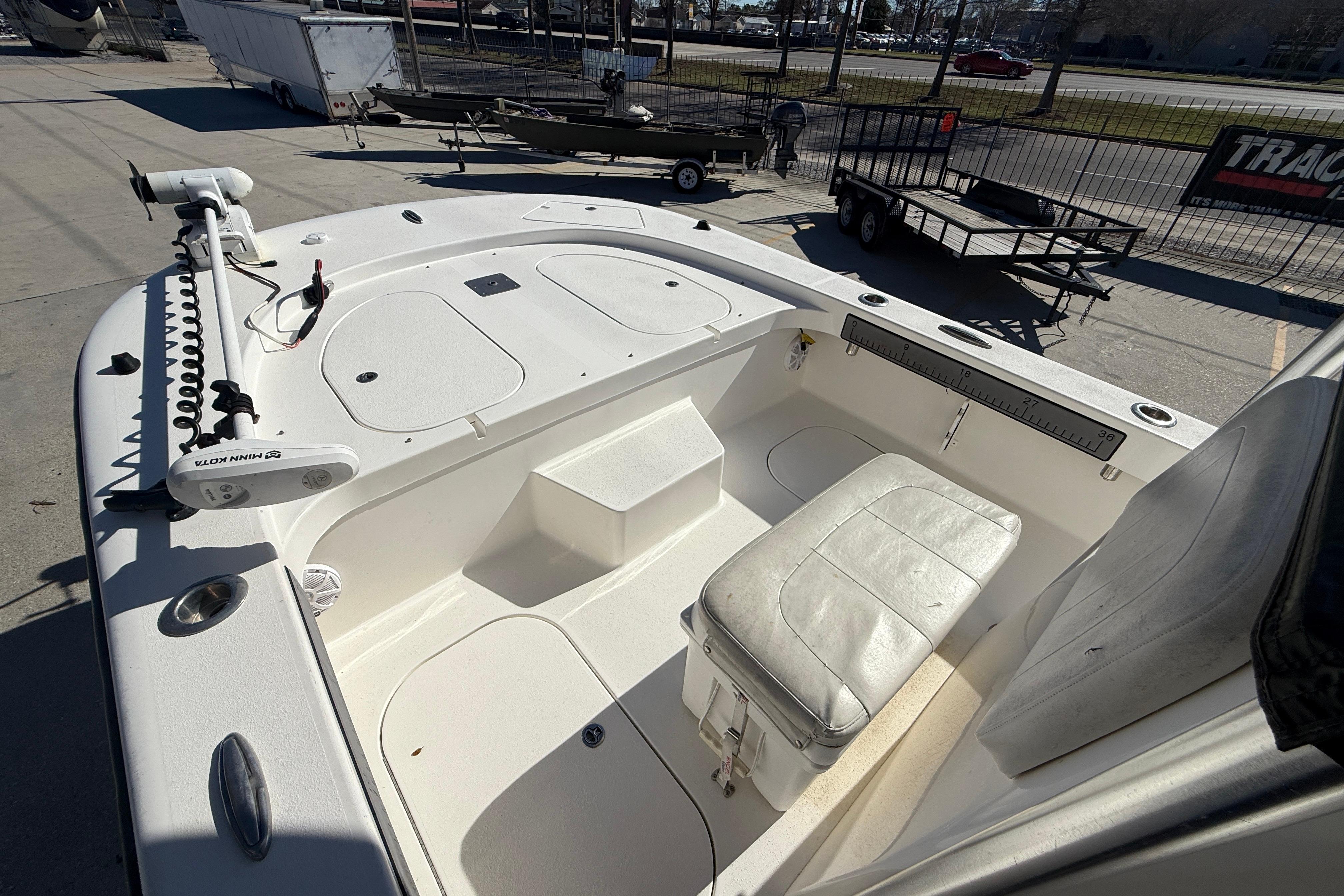 2020 Tideline 235 Hybrid boat interior with seating and storage compartments.