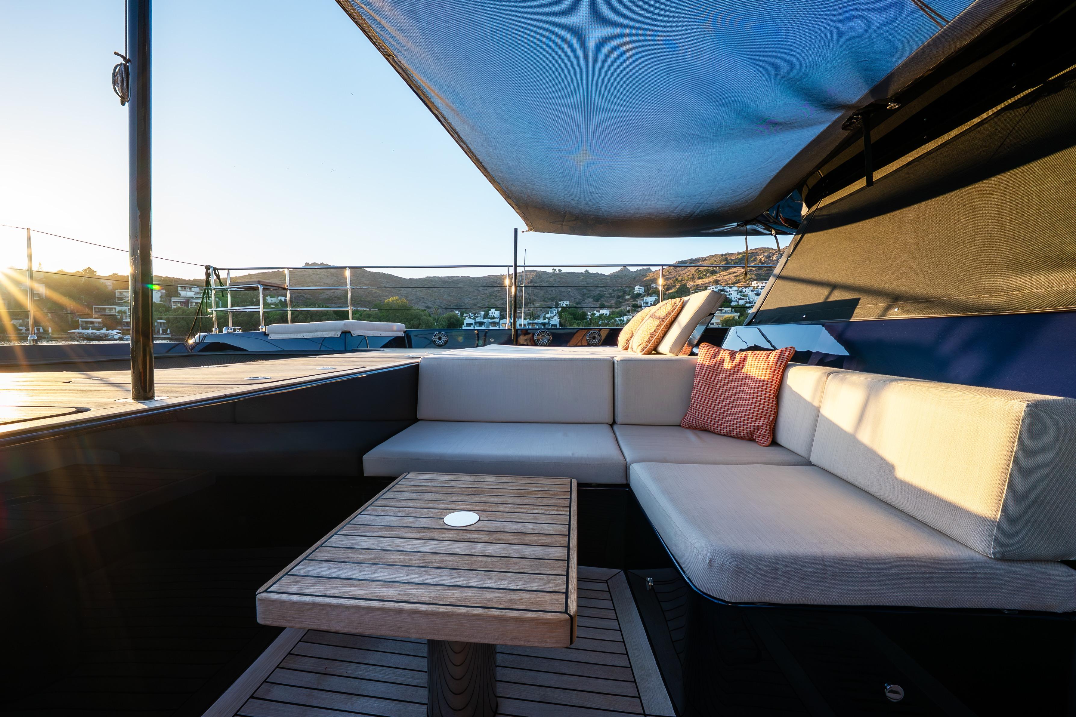Luxurious Sunreef 60 Eco yacht deck with comfortable seating, 2024 model.