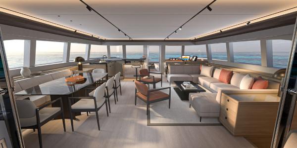 Luxurious interior of 2025 Lagoon 83 yacht with modern furnishings and ocean view.