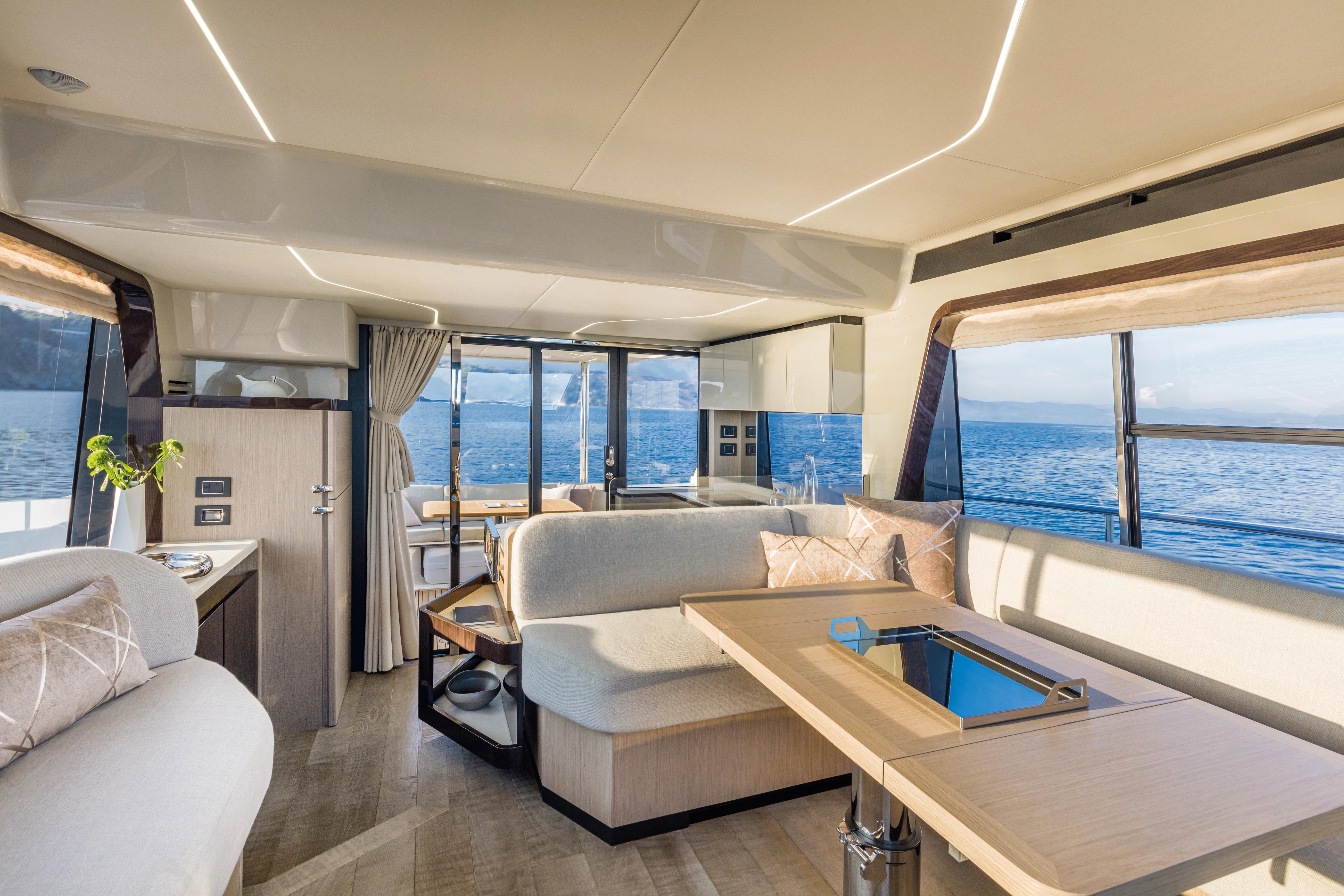 Luxurious interior of 2025 Absolute 47 Fly yacht with panoramic ocean views.