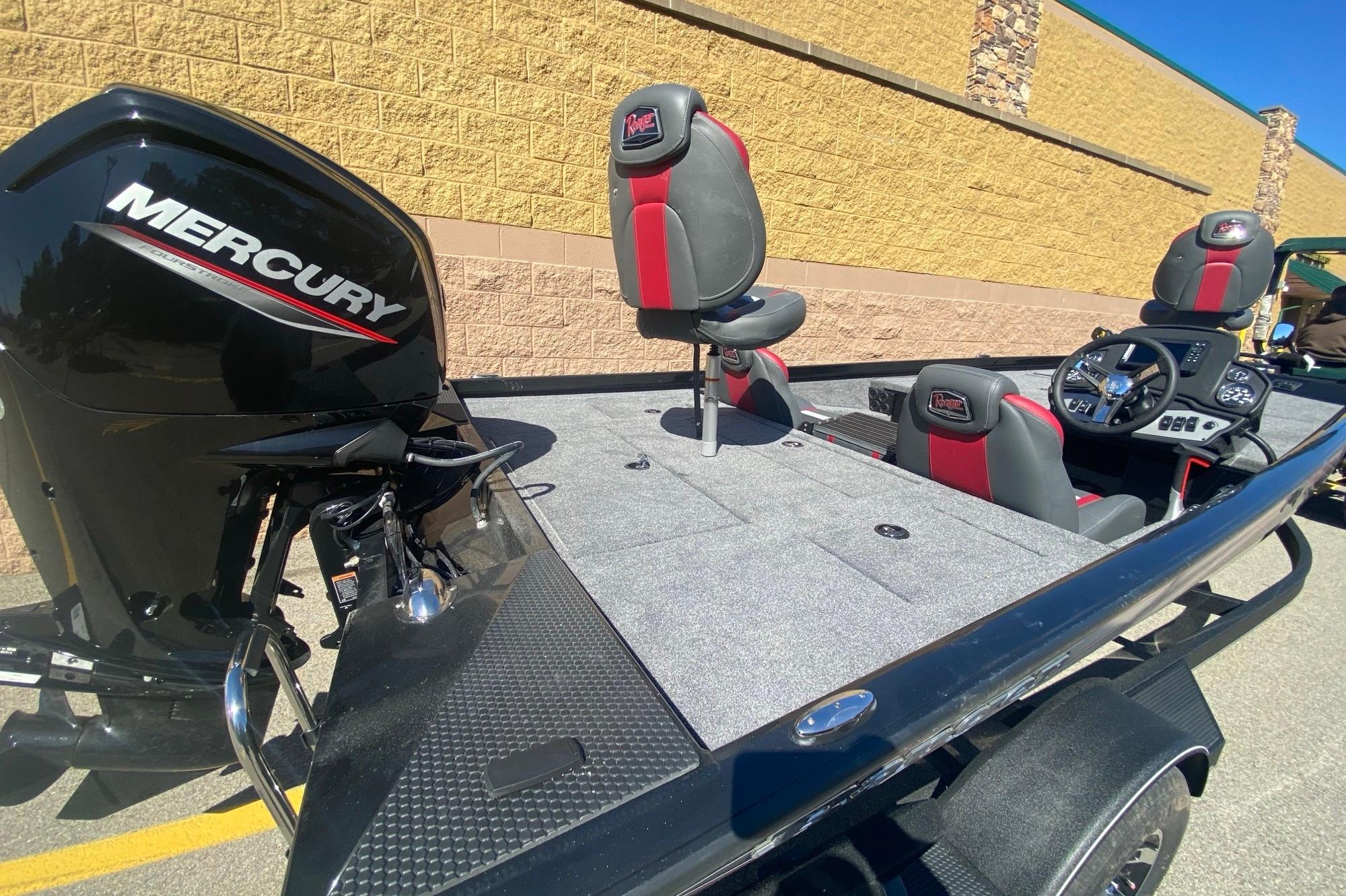 2026 Ranger RT188 boat with Mercury engine, featuring red and black seating.