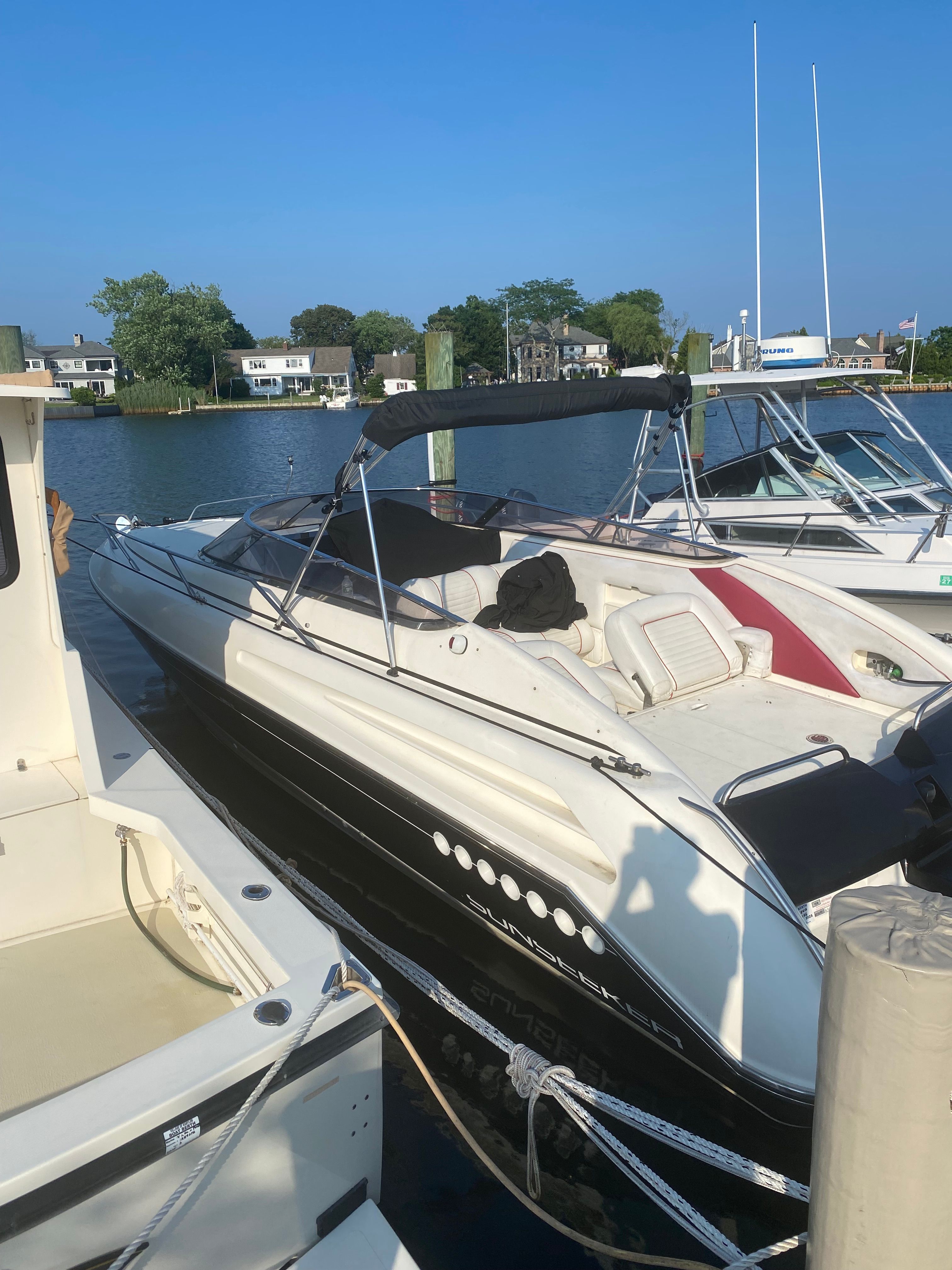 1994 Sunseeker Hawk 31 docked at marina.
